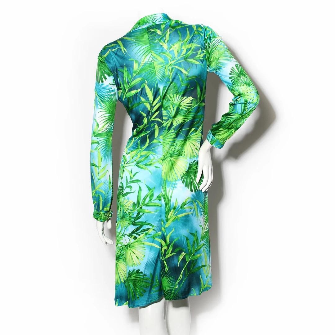 Gianni Versace by Donatella Versace Dress 
Spring / Summer 2000 Ready-to-Wear 
Look 1 
Made in Italy 
Iconic Versace Palm print 
Green and blue 
Polo collar 
Plunging neckline 
Iridescent rainbow faceted buttons down front of dress 
Dress has tie in