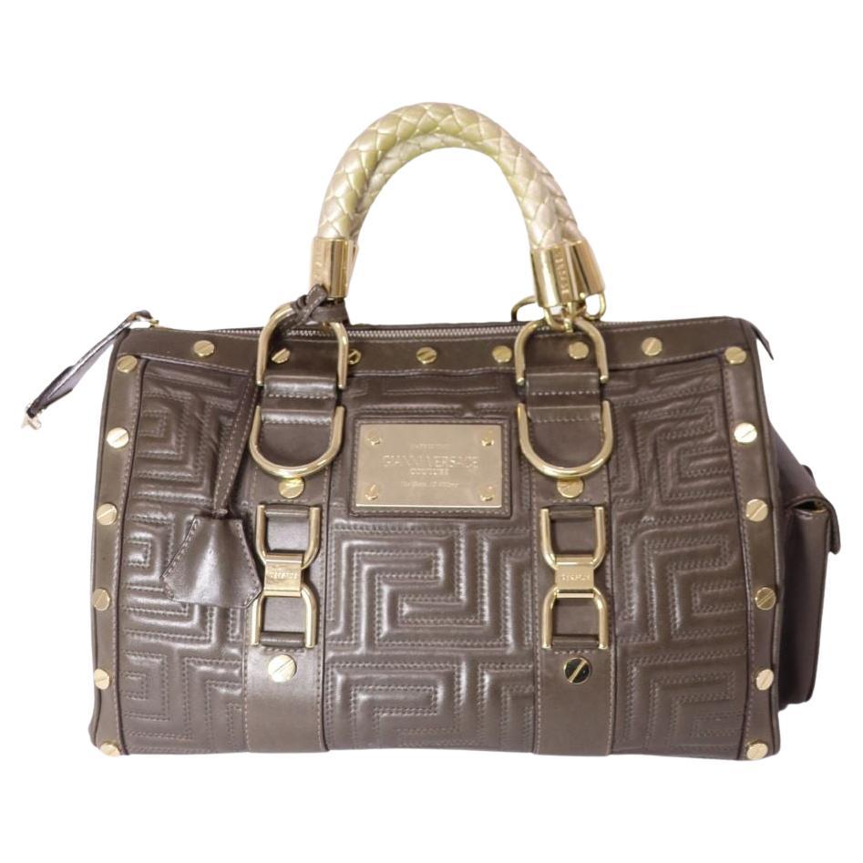 Where are Versace handbags made?