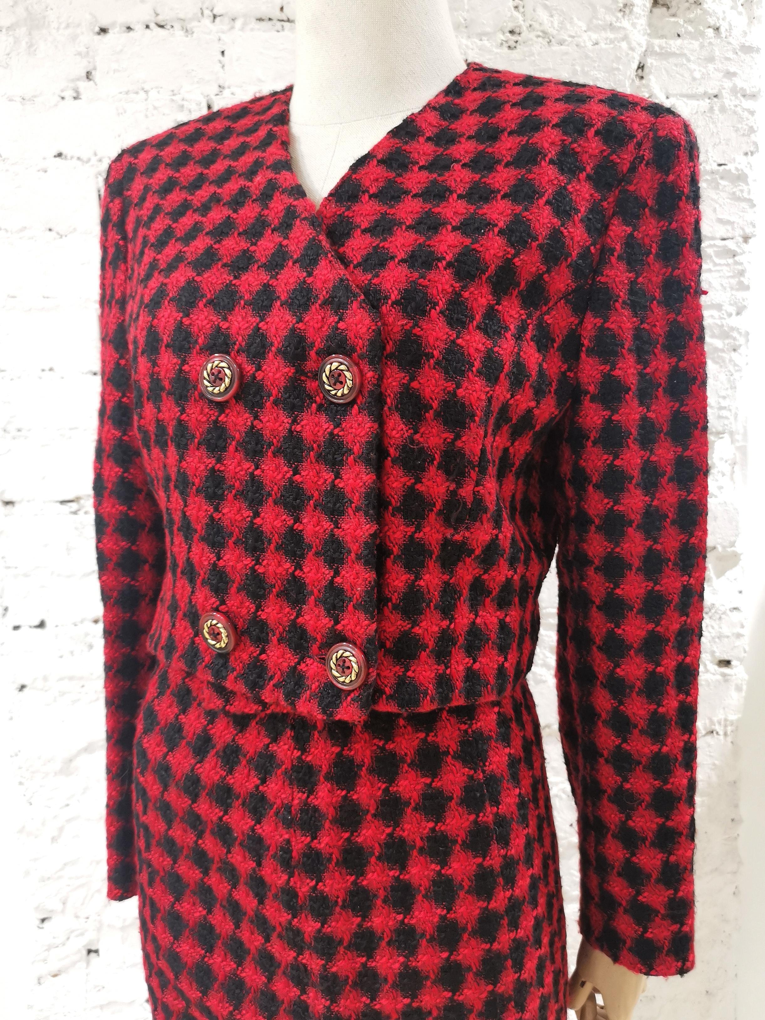 Gianni Versace red and black wool skirt suit
totally made in italy in size 46