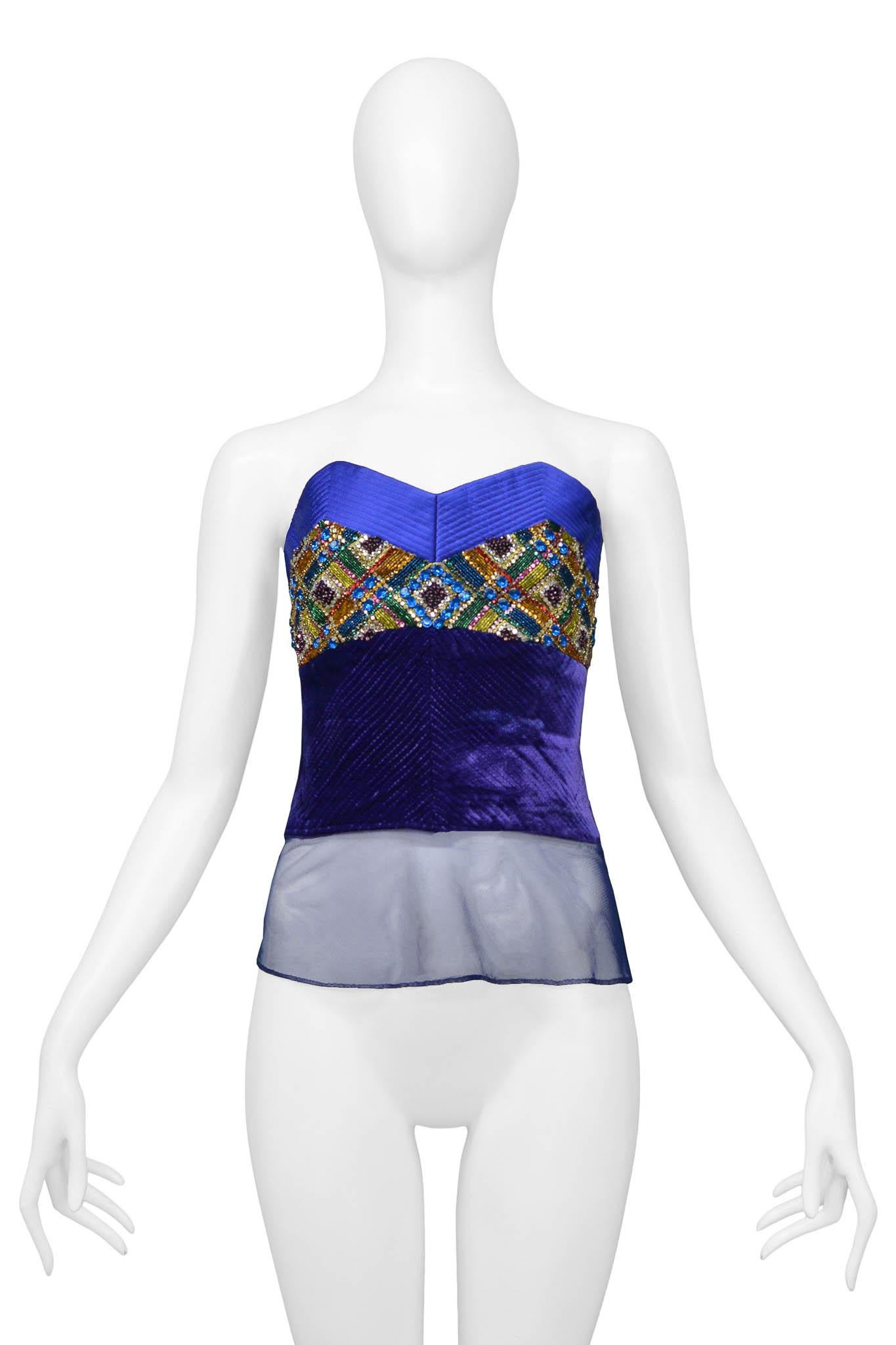 Resurrection is excited to offer a vintage Gianni Versace blue satin and purple velvet Versace Couture bustier featuring an intricate multicolor rhinestone design, mesh hem, and decorative topstitching. 

Versace
Size Tag Missing 
Measurements:
Bust