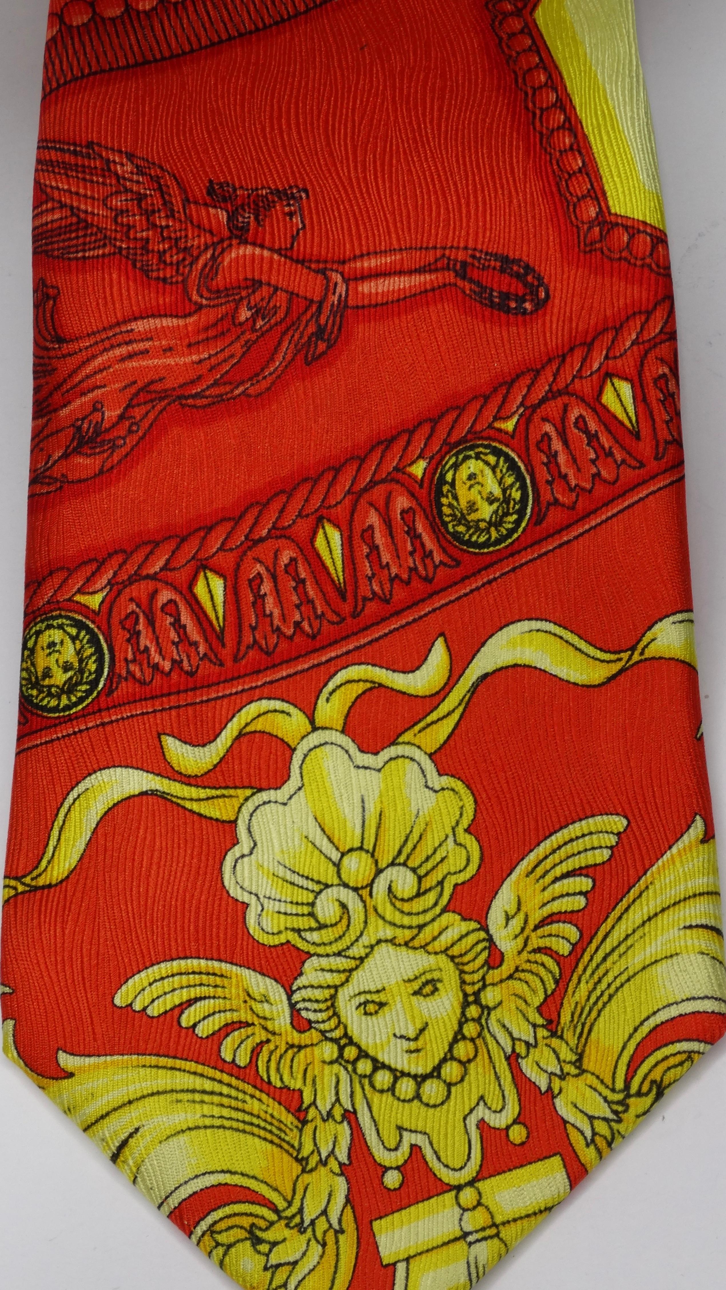 Snag yourself a piece from the Versace archives! Circa 1990s, this silk tie features a colorful roman clock motif with images throughout of Medusa and Baroque designs. Classic and timeless, this coveted piece will pair perfectly with your favorite