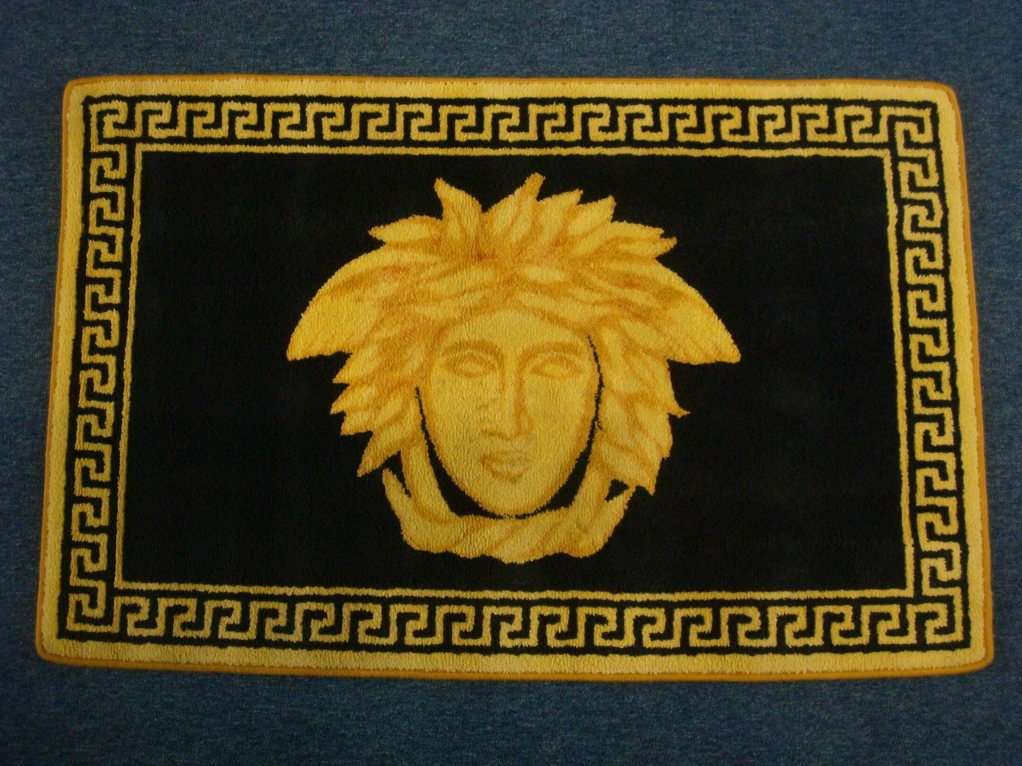 Black Gold Rug by Gianni Versace for Versace.  Medusa Original. Italy 1980´s.
It has the creativity and love of Gianni Versace's Classic style.
The style of the design is reminiscent of the designer.
This is a vintage Gianni Versace wool rug.