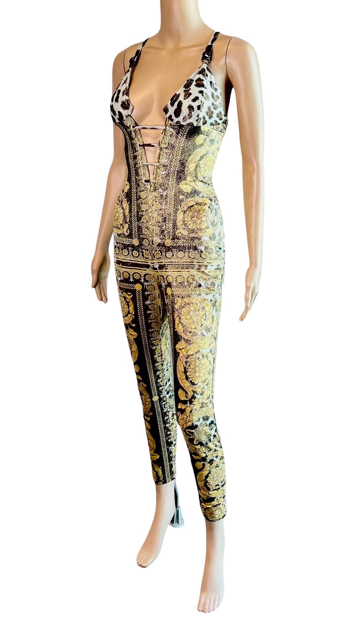 Gianni Versace S/S 1992 Runway Vintage Bustier Embellished Baroque Catsuit Jumpsuit IT 42

Gianni Versace Couture jumpsuit featuring plunging bustier neckline, cutout open back, lace up front and back held by ribbons connected to crystal embellished