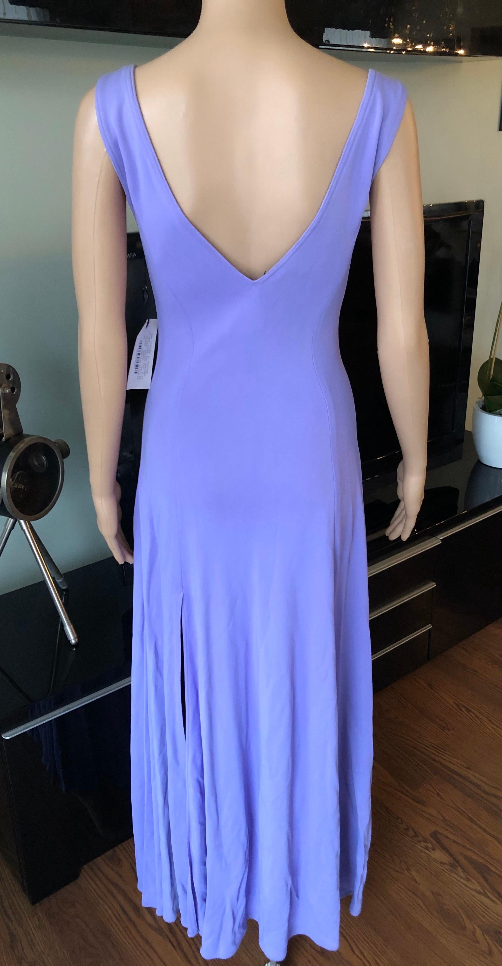 Gianni Versace S/S 1993 Runway Vintage Maxi Evening Dress IT 42

Look 13 from the Spring 1993 Collection. Gianni Versace lavender maxi evening dress featuring plunging neckline, four high-slits at hem and concealed zip closure at side. Includes
