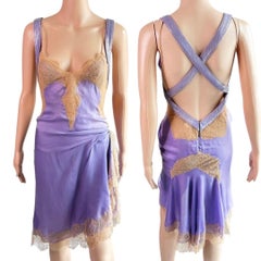 Gianni Versace, abito in pizzo trasparente e rete metallica, impreziosito dalla passerella P/E 2003