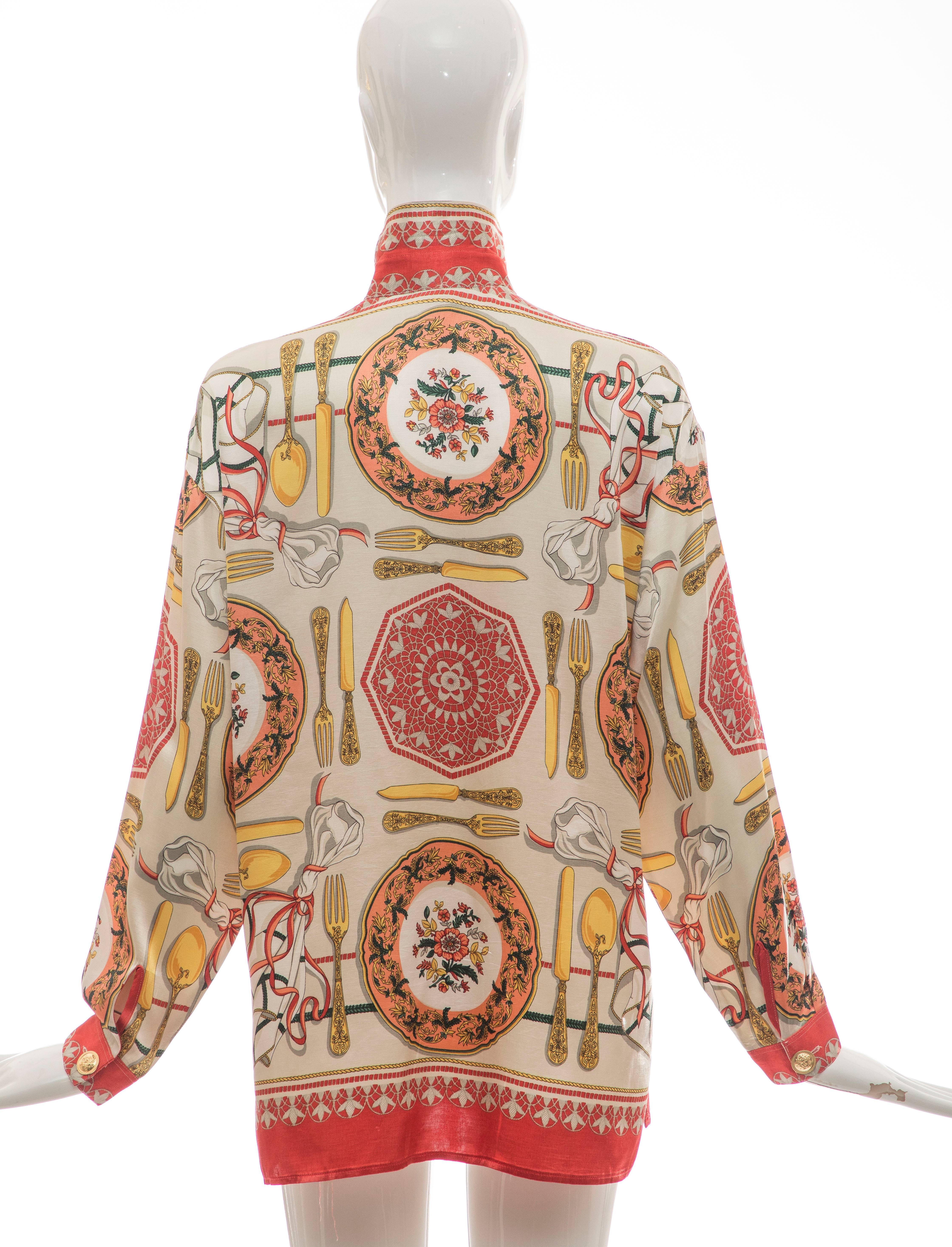 Gianni Versace, Circa 1990's silk shirt with dinner service print throughout, point collar, vents at sides, one-button cuffs and gold-tone Medusa head button closures.

IT. 46

Bust 42, Length 27.5, Sleeve 30.5
