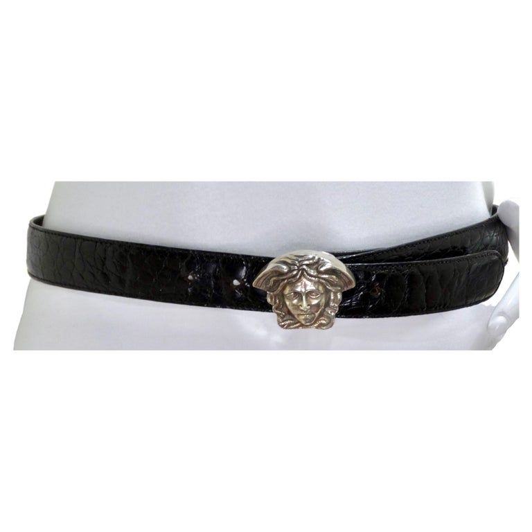This is one from the Gianni Versace original archives! Don't miss out! This is a Gianni Versace crocodile black leather belt with bold and chunky silver-toned metal Medusa belt clasp (5x4cm). Elevate any simple outfit by pairing it with cool