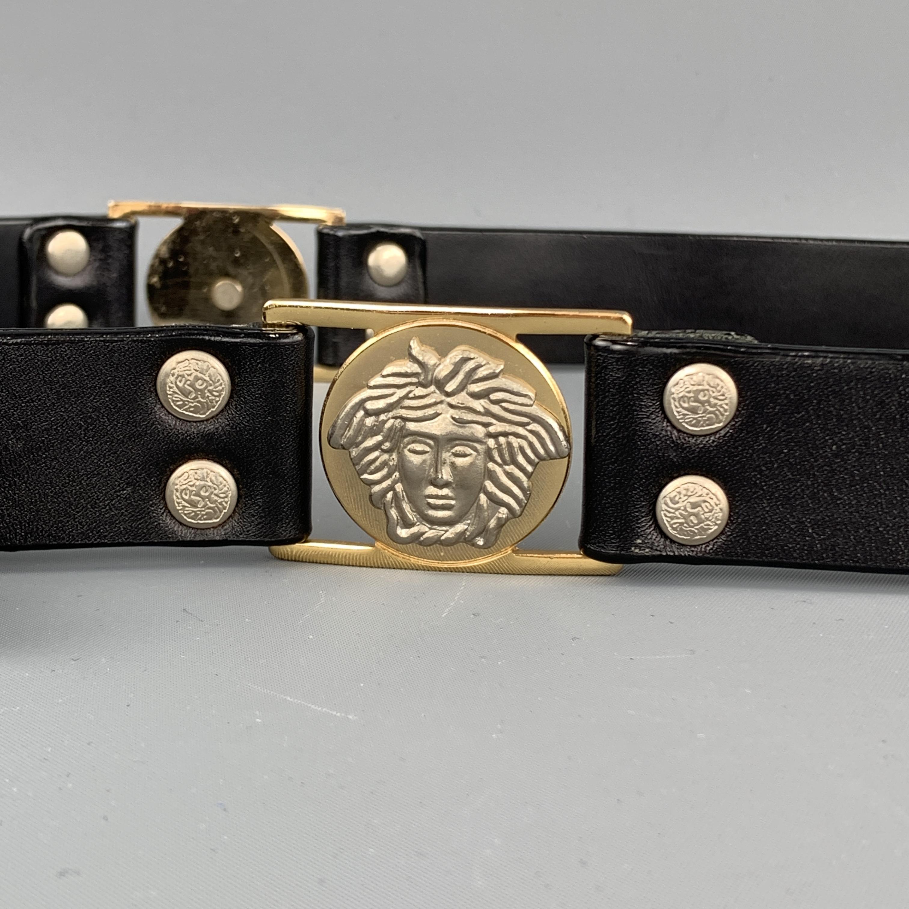 GIANNI VERSACE Size 30 Silver & Gold Medusa Studded Black Leather Waist Belt In Excellent Condition In San Francisco, CA