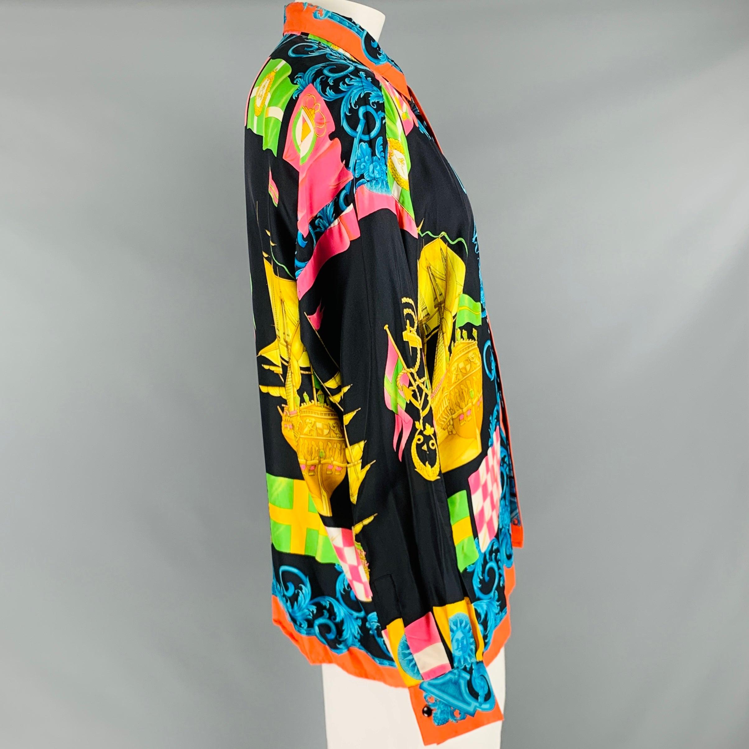 Vintage GIANNI VERSACE long sleeve shirt
in a multi-color silk fabric featuring a vibrant nautical print, button-down collar, and hidden button closure. Made in Italy.Good Pre-Owned Condition. Moderate signs of wear and marks on left sleeve, as is.