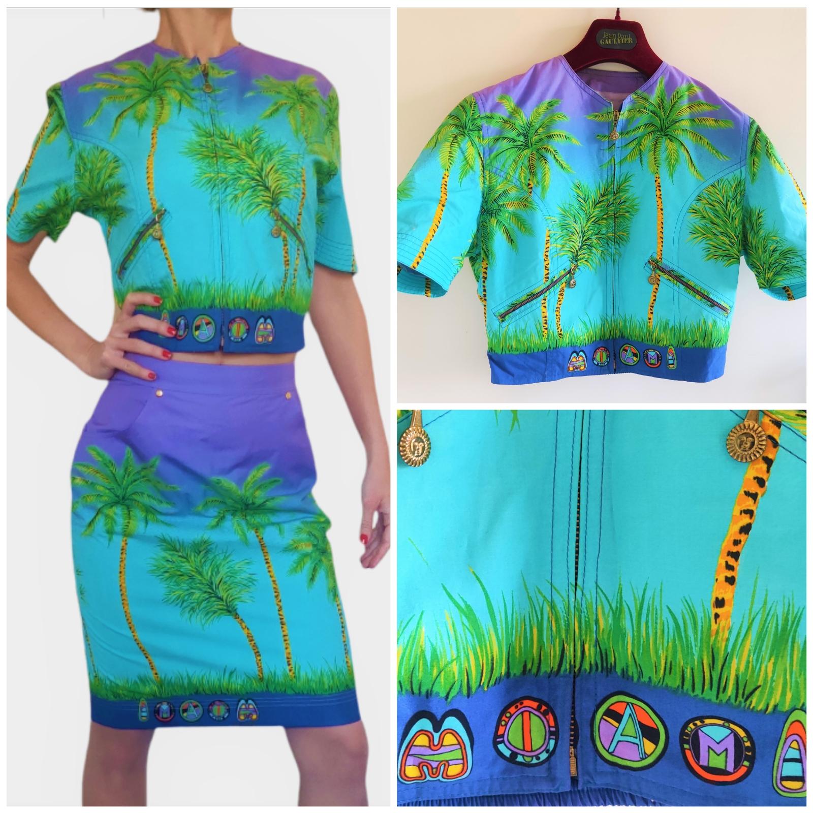 Walk on sunshine with this amazing Versace set! Circa late 1980s/early 90s, this suit is made from 100% Cotton and features a colorful motif comprised of Versace's designs, Miami signature and palm trees. 
Sun button.
Material: 100%