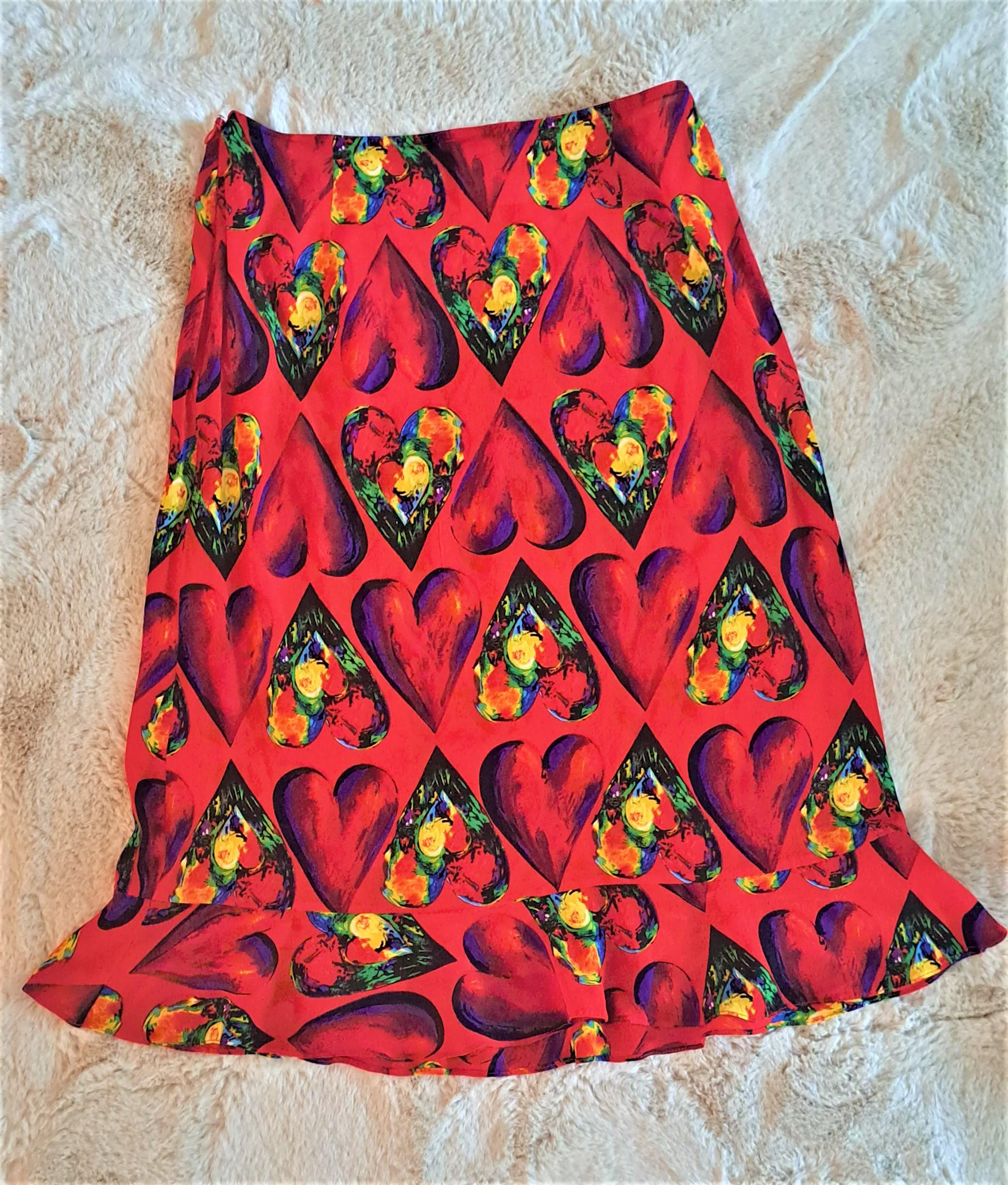 Gianni Versace Couture red heart print silk sheer blouse from the Spring/Summer 1997 collection. 

Red & floral heart print inspired by Jim Dine. 
Ruffle detail at neck, cuffs, and waist. 
Button front with Versace Medusa logo buttons.
Size 44 but