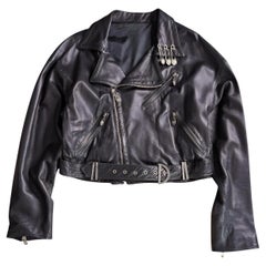 Gianni Versace SS 1994 biker jacket in black leather with Medusa details