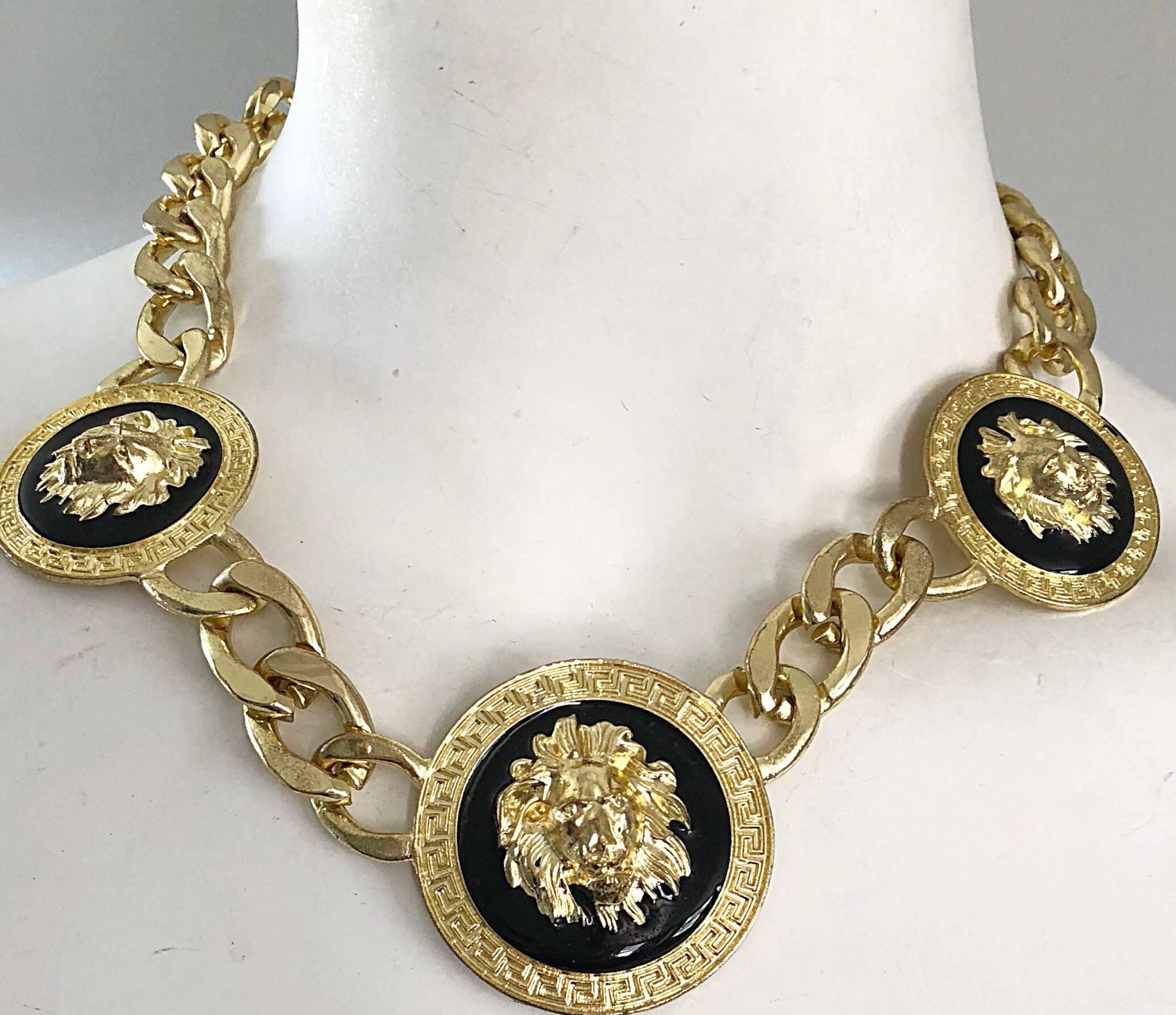 Amazing vintage 90s vintage GIANNI VERSACE style lion head Medusa style gold and black choker necklace! The necklace to complete any outfit! Adjustable length, and be worn day or evening, In great condition. Unsigned, and very well made.