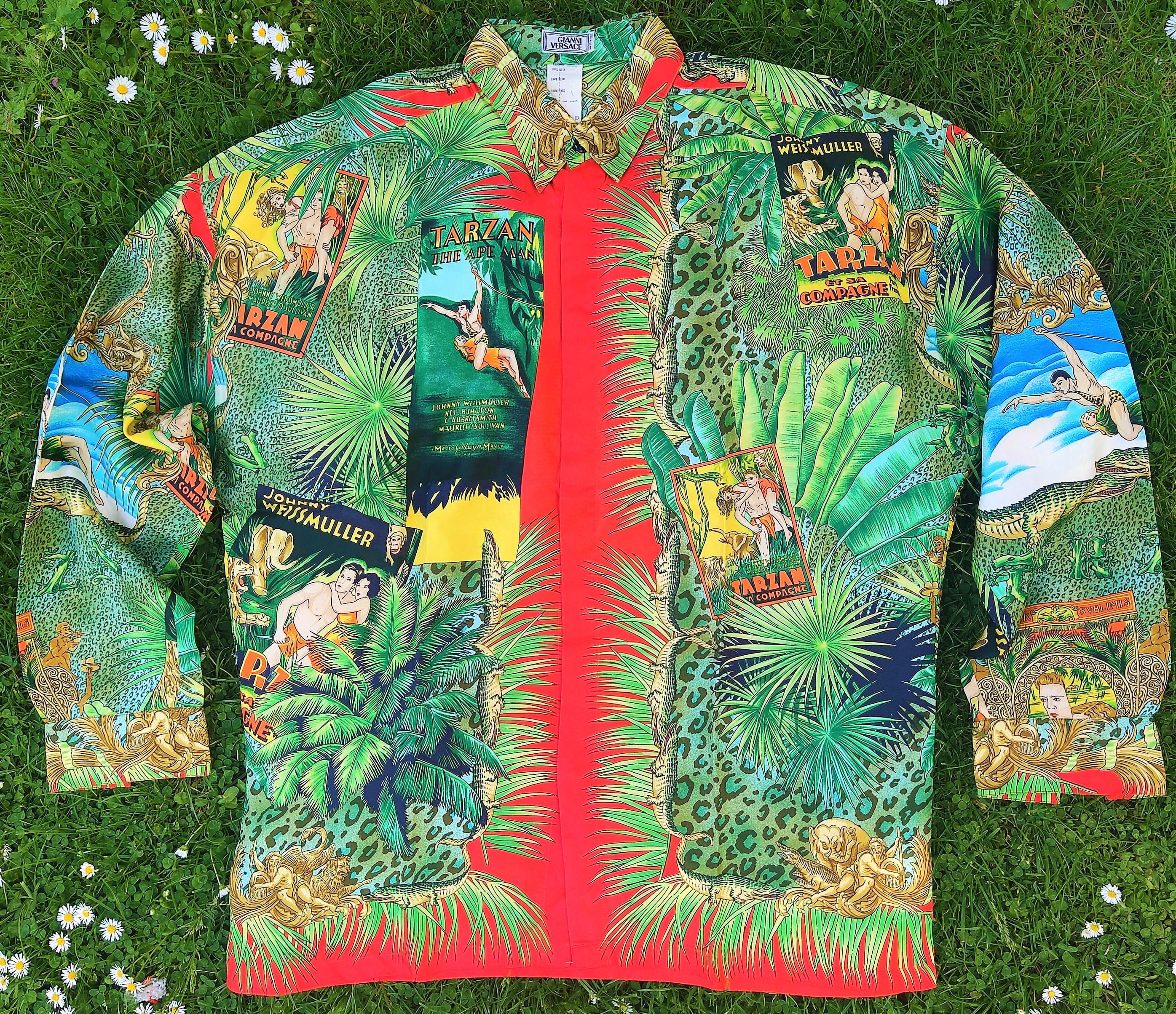 Amazing Tarzan silk shirt by Gianni Versace!
From the spring summer 1993 collection!

Pattern: 
Tarzan saves Jane in
Posters of the movie
The cast of the movie (Metro Goldwyn Mayer)
Cocodiles 
Angels
Big TARZAN text on the back
Monkeys, elephants,