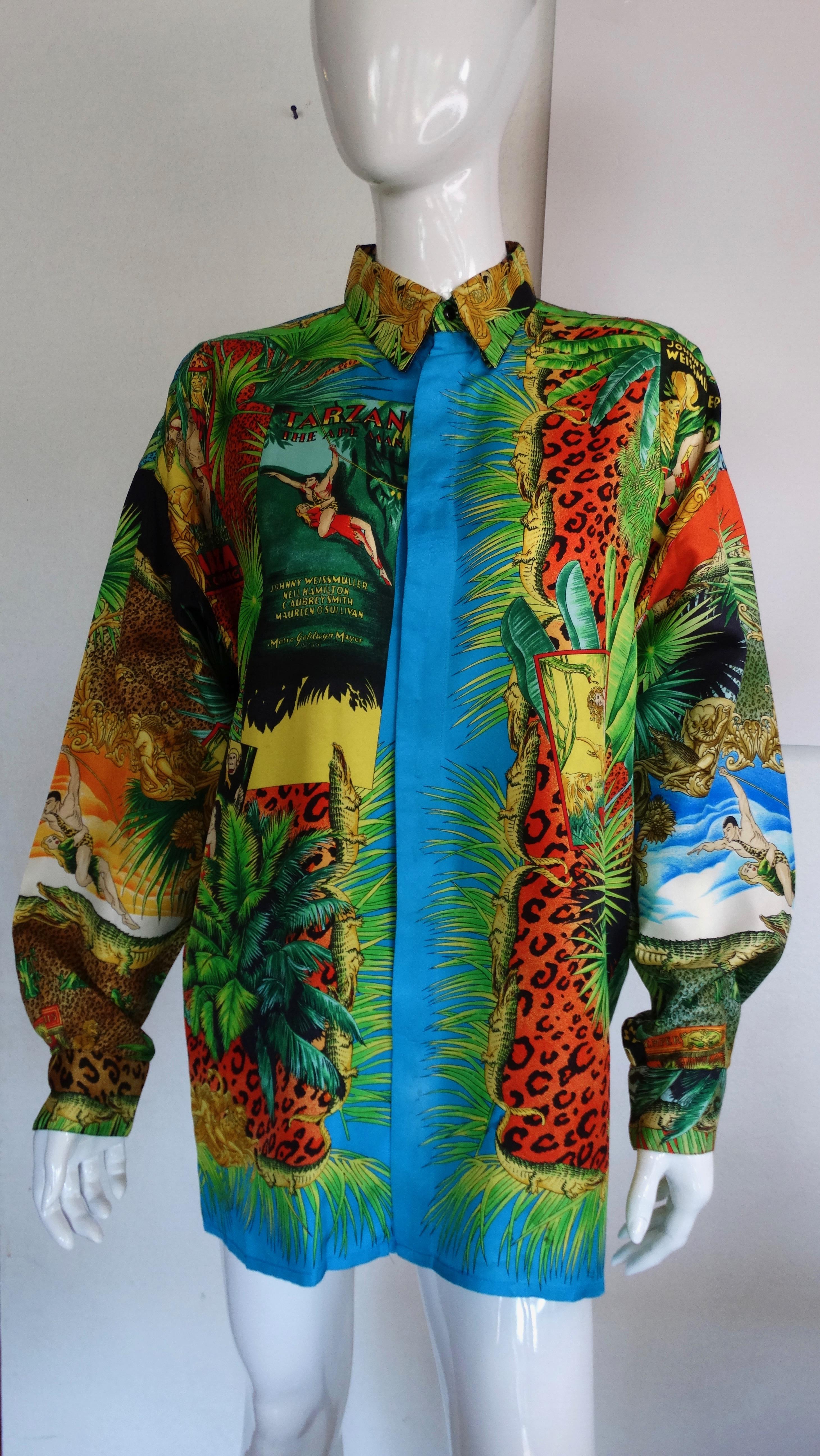 Snag yourself a piece straight from the Versace archives! Circa 1993 from Versace's S/S collection, this tropical Tarzan print features various motifs of Tarzan and Jane, Tarzan memorabilia, multi-colored animal prints, tropical greenery and rich