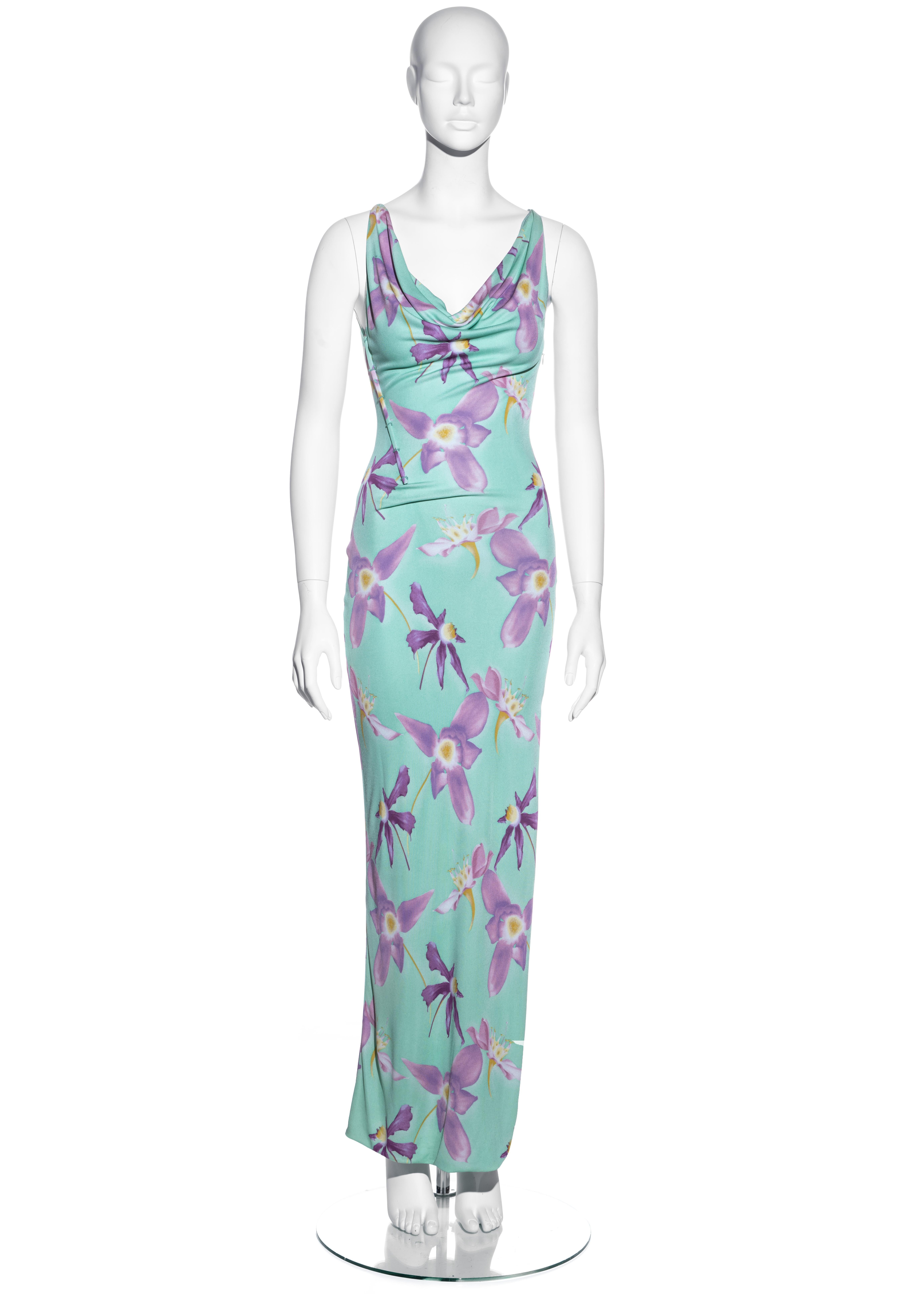 ▪ Gianni Versace turquoise orchid print maxi dress
▪ 62% Rayon, 25% Acetate, 13% Nylon
▪ Cowl neck
▪ External corsetry boning on right side
▪ High leg slit on left side
▪ IT 38 - FR 34 - UK 6 - US 2
▪ Spring-Summer 1999