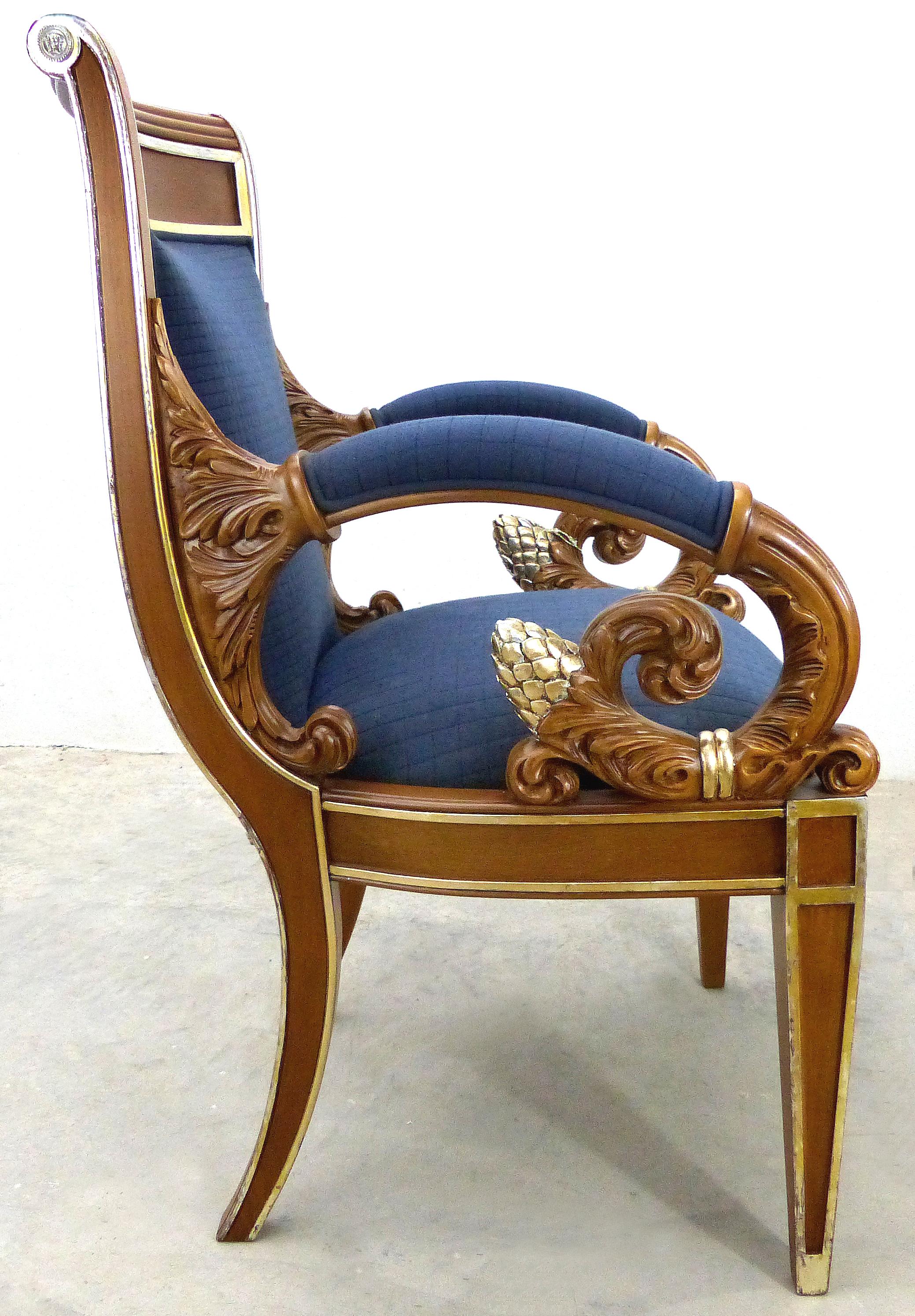 Gianni Versace Vanitas Carved Armchair with a Scrolling Arm and Gilt Details

Offered for sale is a heavily carved armchair designed by Gianni Versace as part of the 1994 collection. The beautifully carved, scrolling arms end in cornucopias with a