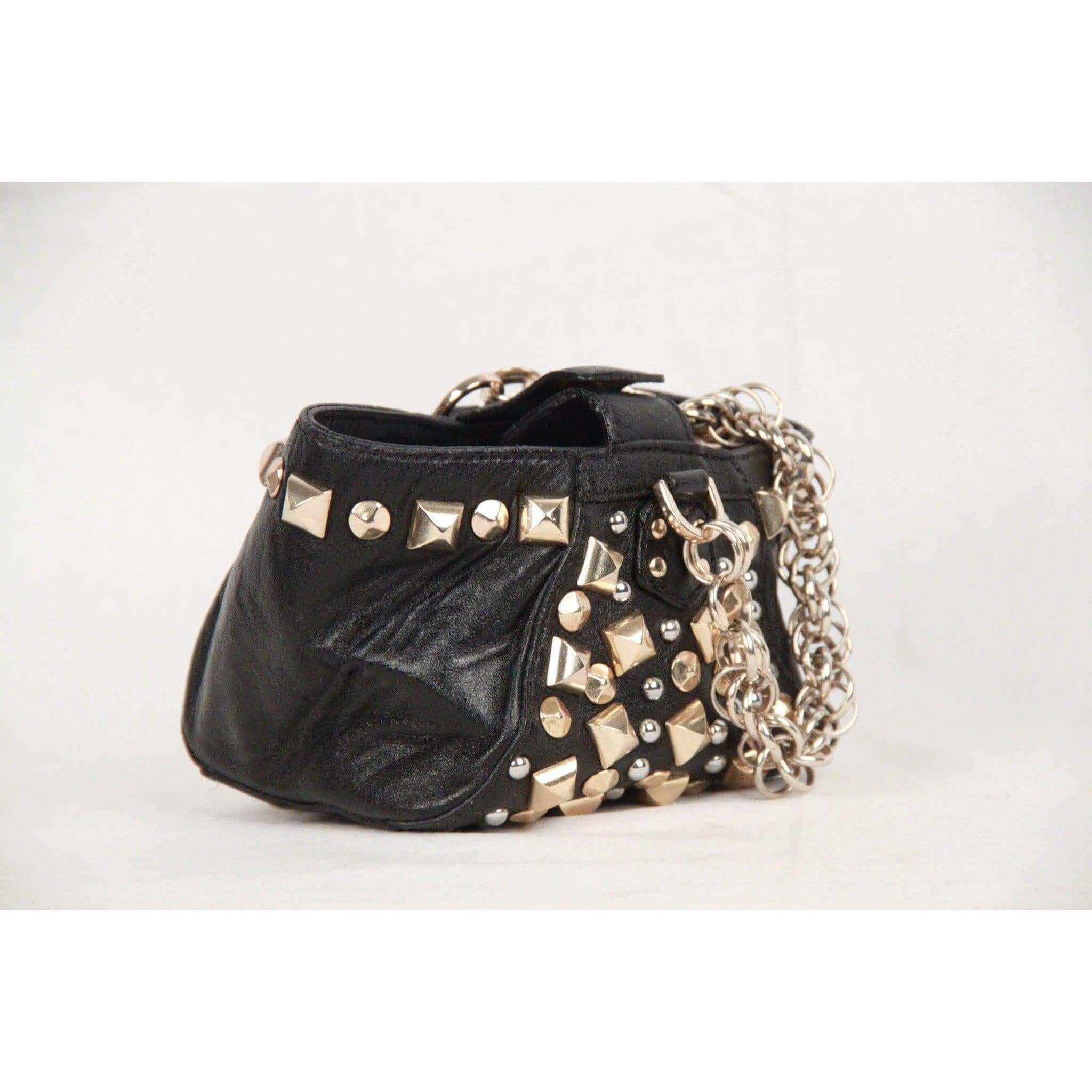 MATERIAL: Leather COLOR: Black MODEL: Mini Bag GENDER: For Her SIZE: Extra-Small Condition B :GOOD CONDITION - Some light wear of use - Some normal wear of use on bottom corners Measurements BAG HEIGHT: 4 Inches - 10,2 cm BAG LENGTH: 7.25 inches -
