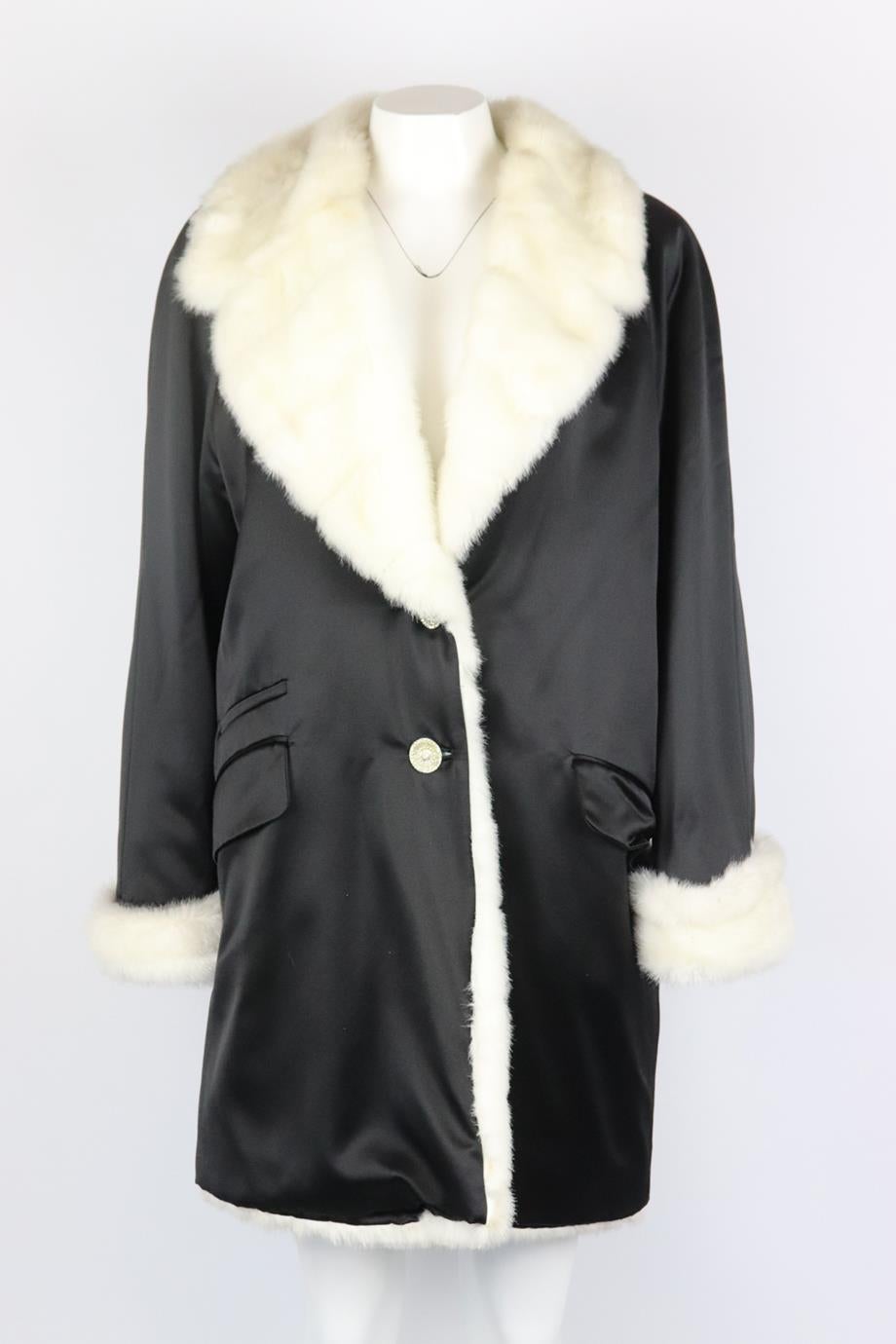 Gianni Versace Versatile Couture faux fur lined satin coat. Black and white. Long Sleeve, v-neck. Button fastening at front. 53% Acetate, 47% wool; lining: 75% cotton, 25% acrylic. Size: IT 42 (UK 10, US 6, FR 38). Shoulder to shoulder: 17 in. Bust: