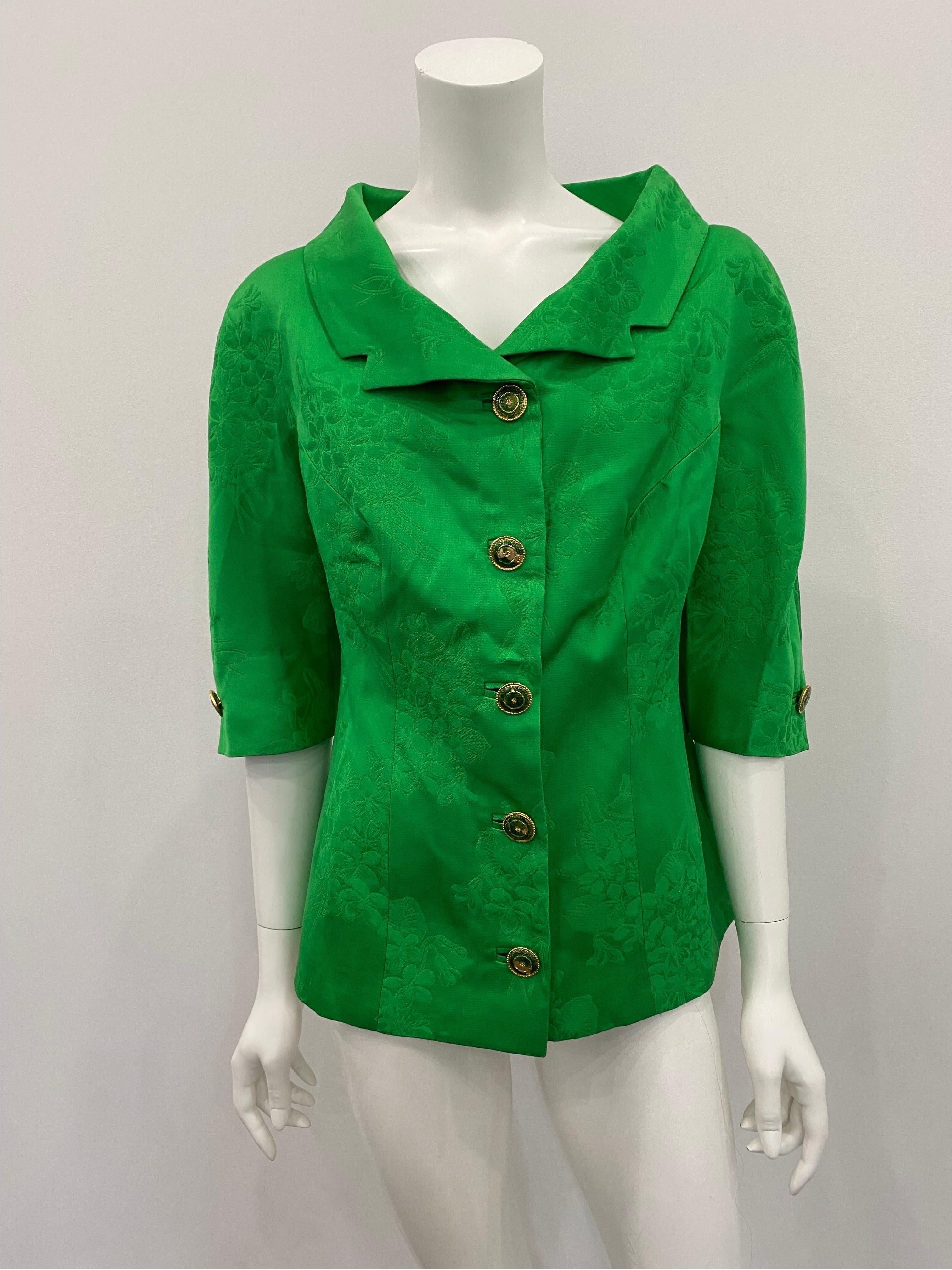 Gianni Versace Versatile Green Silk Damask 3/4 sleeve jacket with portrait neckline - Circa 90’s - Size 42. This collectible and vibrant 3/4 sleeve jacket has 56 front gold and enamel buttons, and one button on each sleeve as well. The jacket is