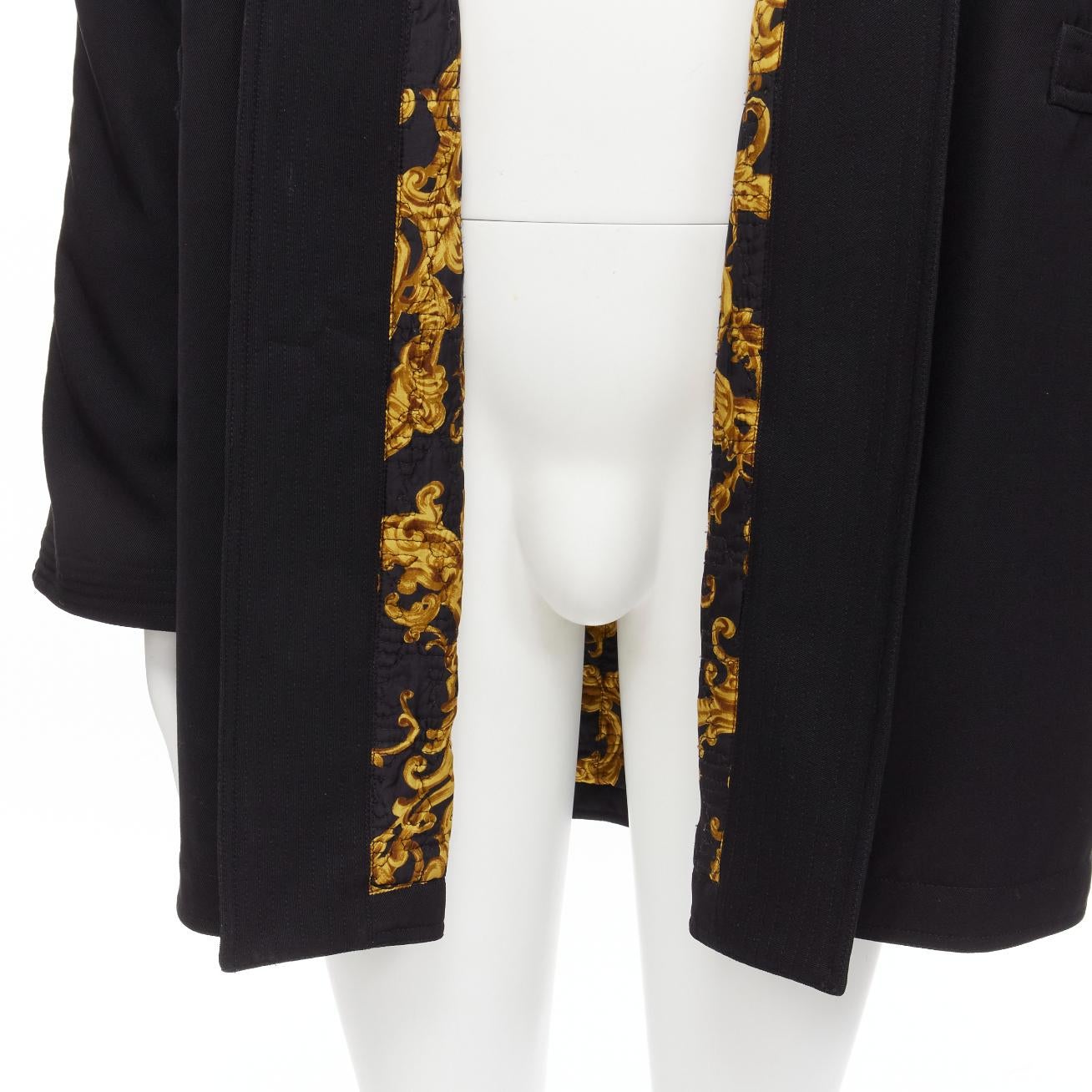 GIANNI VERSACE Vintage 100% wool black gold barocco lined robe coat jacket
Reference: TGAS/D00356
Brand: Versace
Designer: Gianni Versace
Material: Wool
Color: Black, Gold
Pattern: Solid
Lining: Gold Fabric
Extra Details: No closure to the jacket.