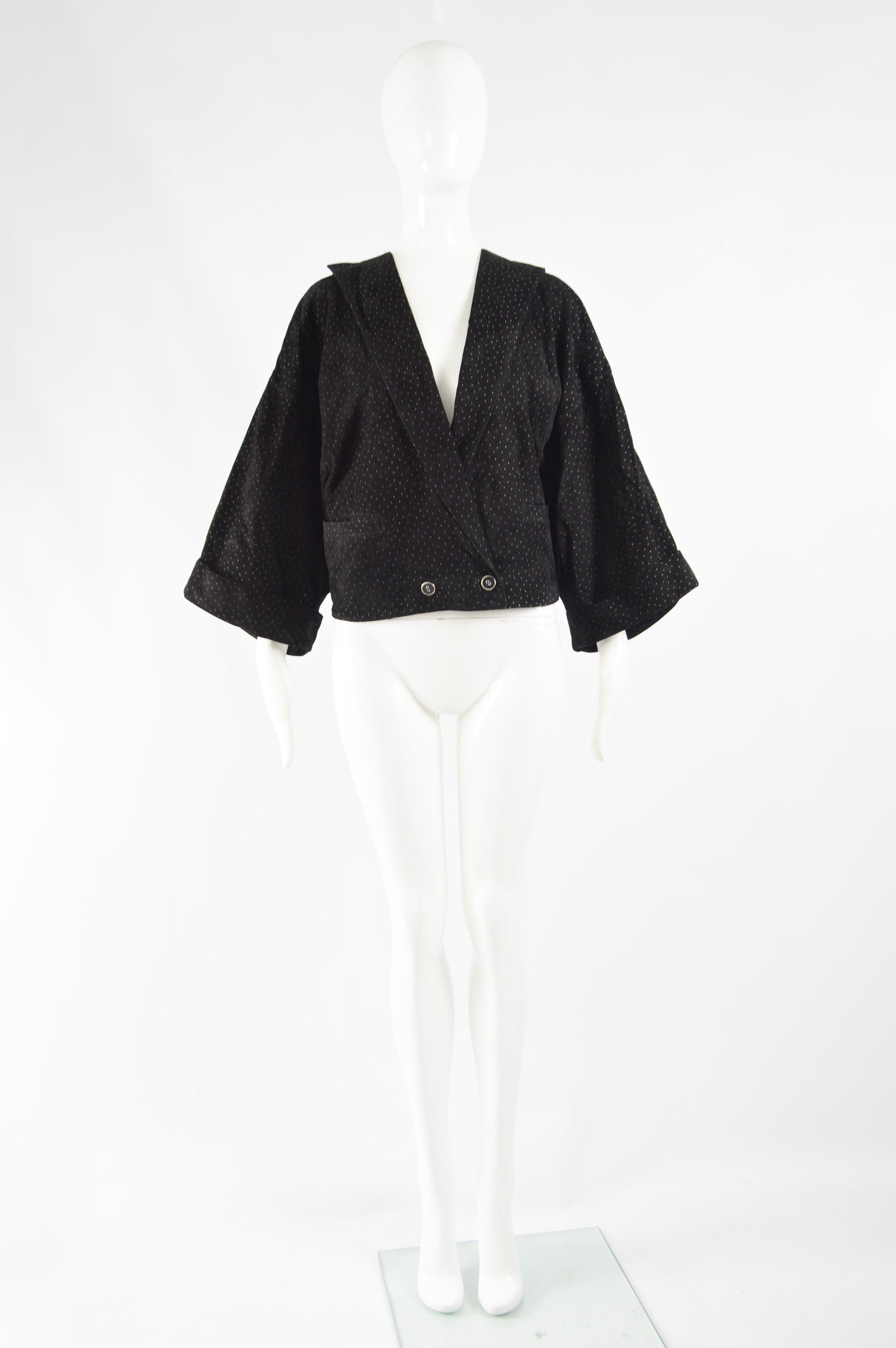 A fabulous vintage womens Gianni Versace womens suede jacket from the 80s. This wide sleeved jacket is a great example of Gianni's earlier work which was much more focused on interesting, oversized silhouettes than his later focus on bold  pop art