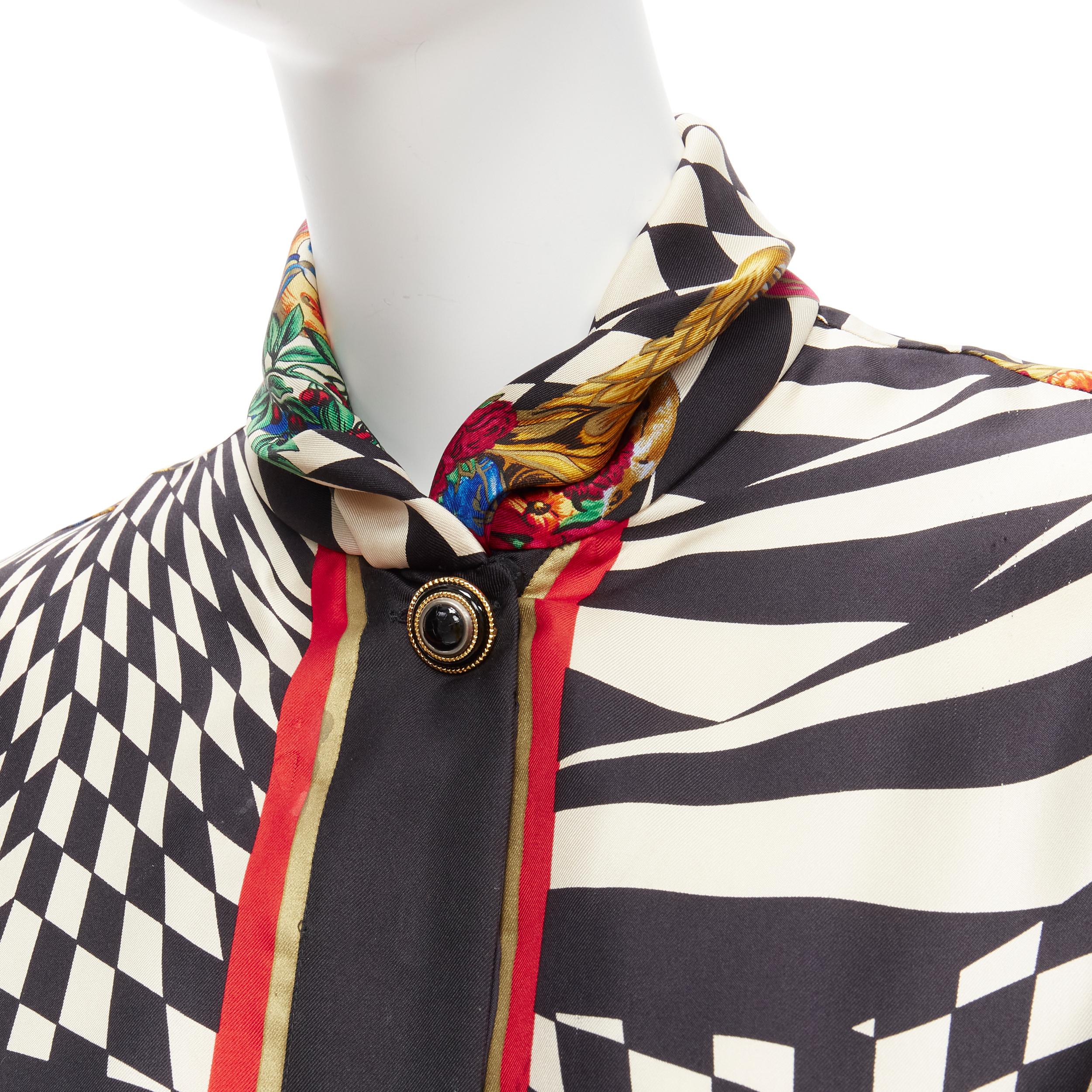 GIANNI VERSACE Vintage baroque royal optical graphic print gold button collar shirt IT38 XS
Reference: TGAS/D00340
Brand: Gianni Versace
Designer: Gianni Versace
Material: Silk, Polyester
Color: Multicolour
Pattern: Barocco
Closure: Button
Extra