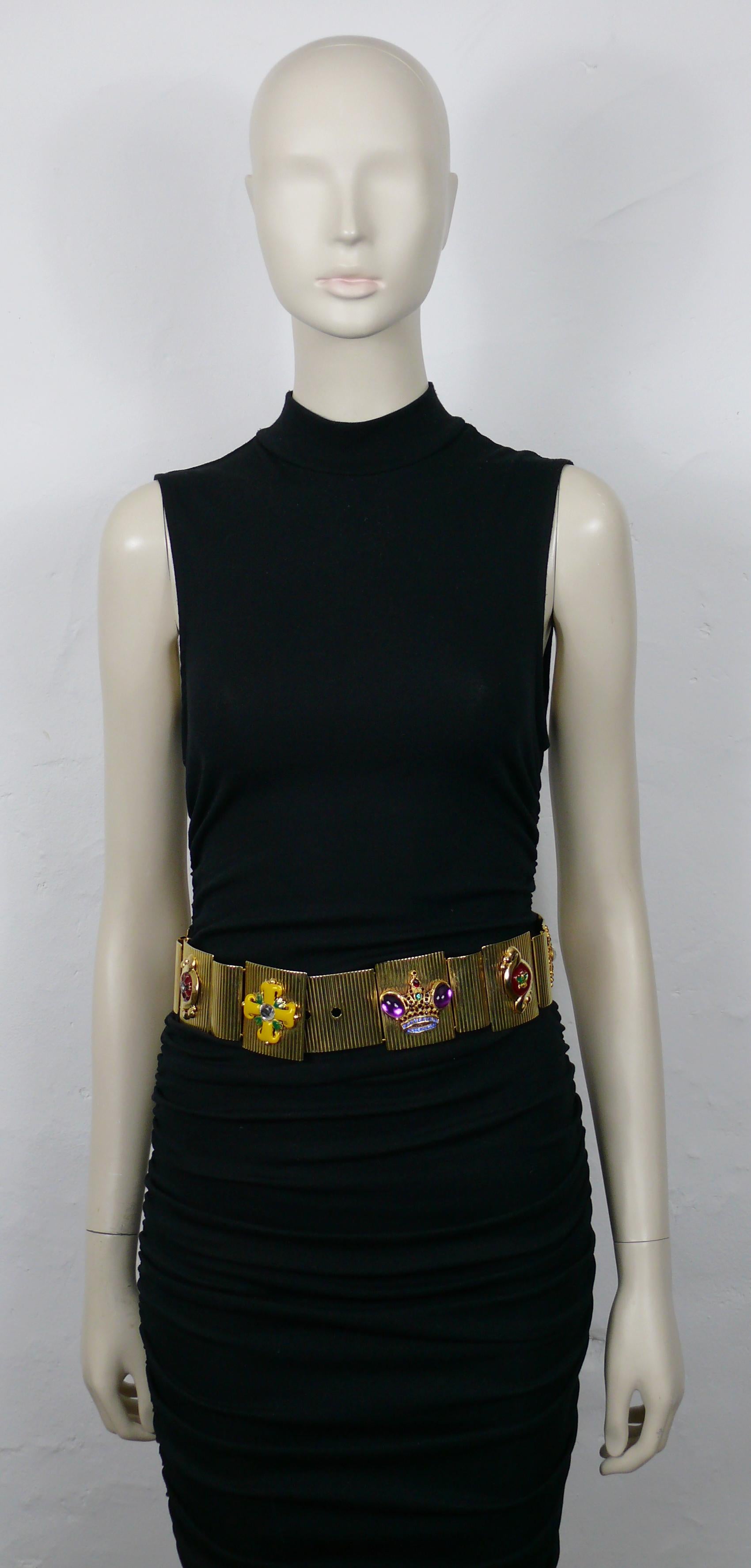 GIANNI VERSACE vintage HONORS & GLORIES belt featuring gold tone striped plate links with medals and crowns embellished with multicolor crystals, acrylic crystals, resin cabochons and enamel.

Hook clasp closure
Adjustable length.

Embossed GIANNI