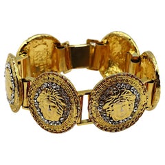 GIANNI VERSACE Bracelet vintage emblématique en cristal Méduse de couleur or