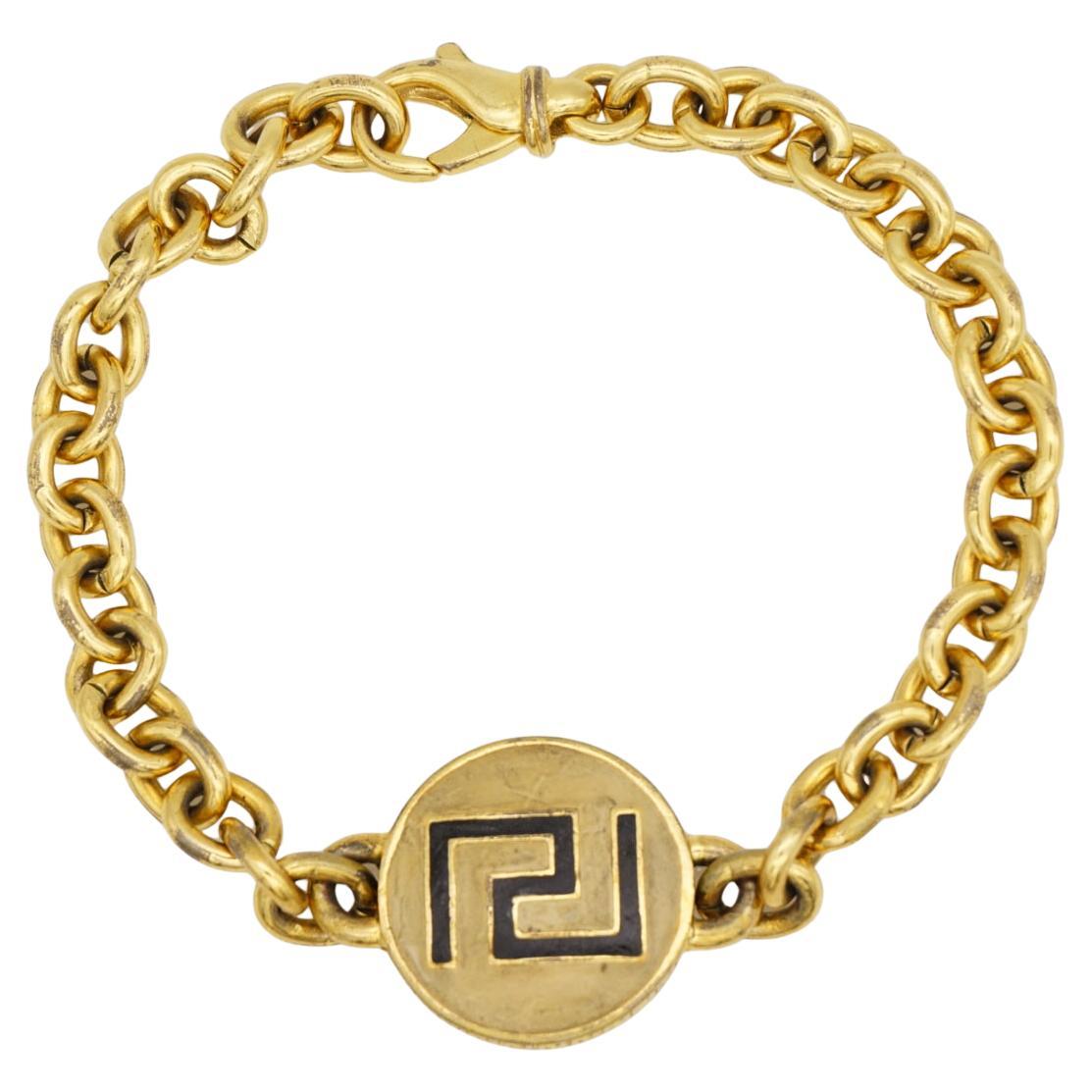 GIANNI VERSACE Vintage Iconic Greca Black Logo Circle Charm Chain Gold Bracelet For Sale