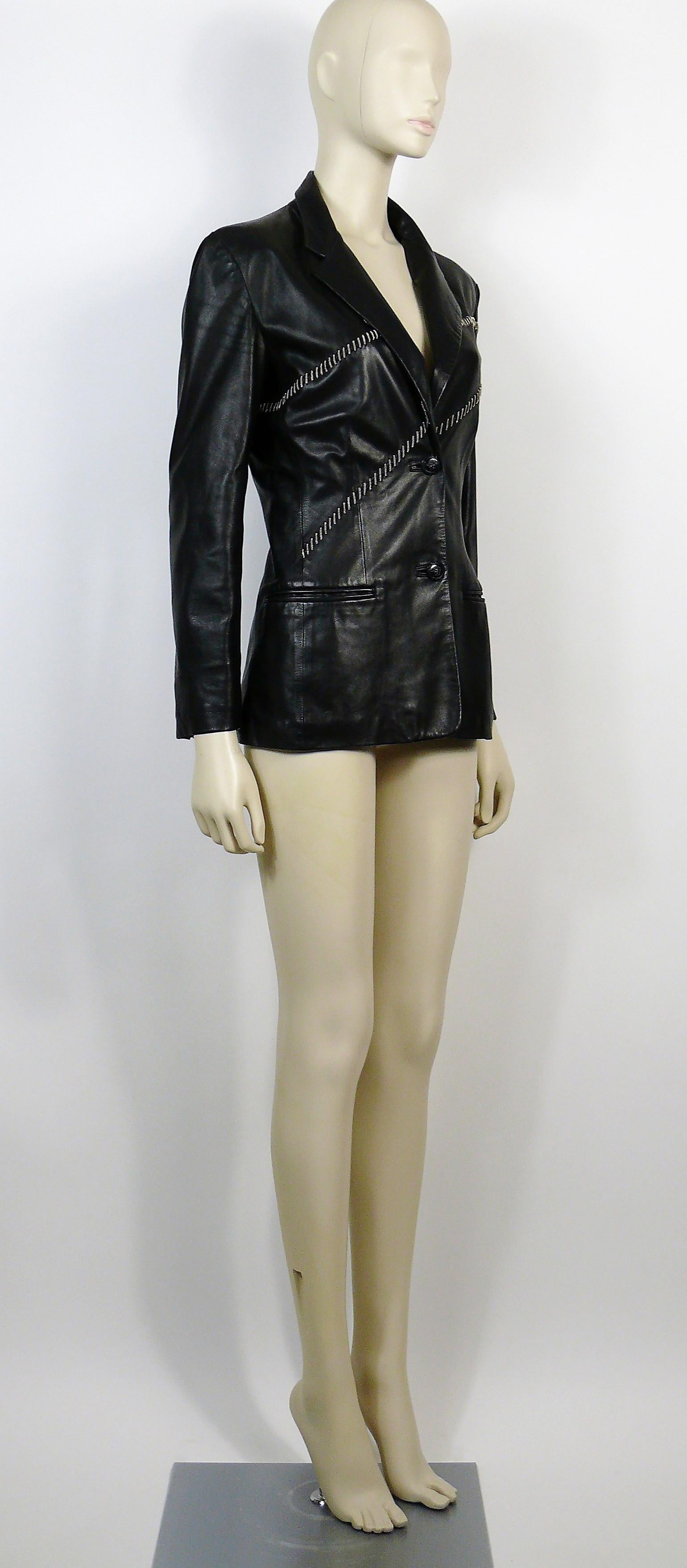 GIANNI VERSACE vintage soft supple black leather blazer embellished with silver toned chains.

Front buttoning.
Black resin signature Medusa head buttons on front and cuffs.

Fully lined.

Label reads GIANNI VERSACE.
Made in Italy.

Size tag reads :