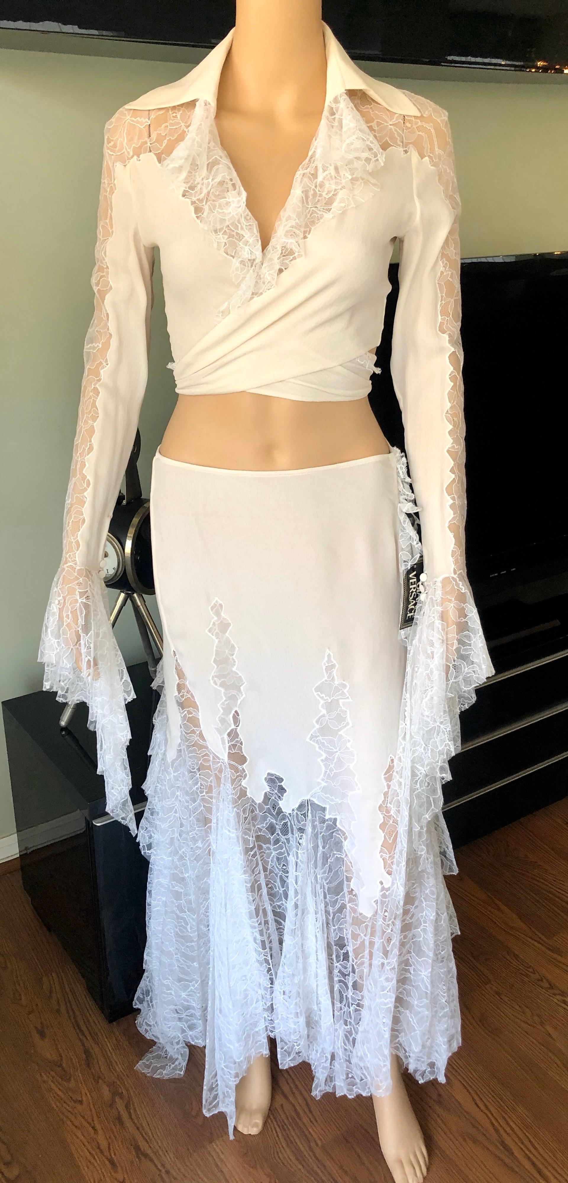 Gianni Versace Vintage Unworn Sheer Lace Panels Silk Ivory Top and Skirt 2 Piece Set  IT 40

Gianni Versace silk skirt set with sheer lace panels and trim throughout, top features pointed collars, long sleeves and sash-tie closure. Skirt features