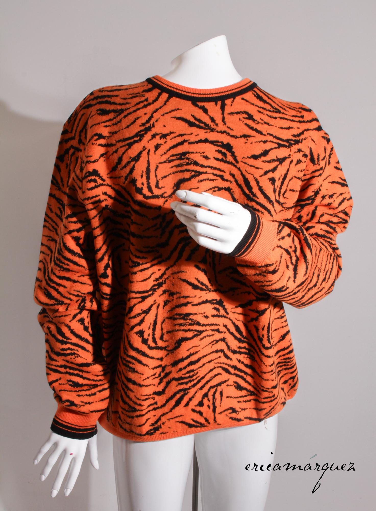 GIANNI VERSACE, Wool, Orange, Tiger Pattern, Crewneck Sweater

Measurements: Chest 48