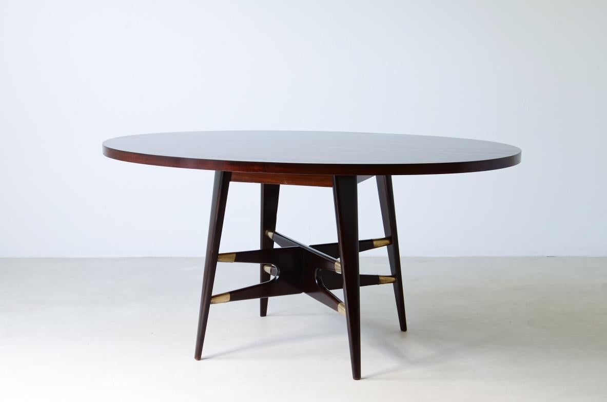 20th Century Gianni Vigorelli, elegant oval table in stained wood  For Sale