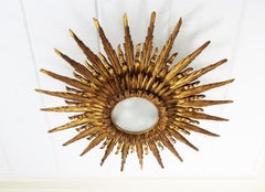 Giant 1930s Baroque Gold Leaf Giltwood Sunburst Ceiling Light Fixture or Mirror