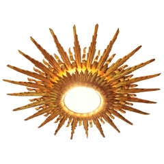 Giant 1930s Baroque Gold Leaf Giltwood Sunburst Ceiling Light Fixture or Mirror