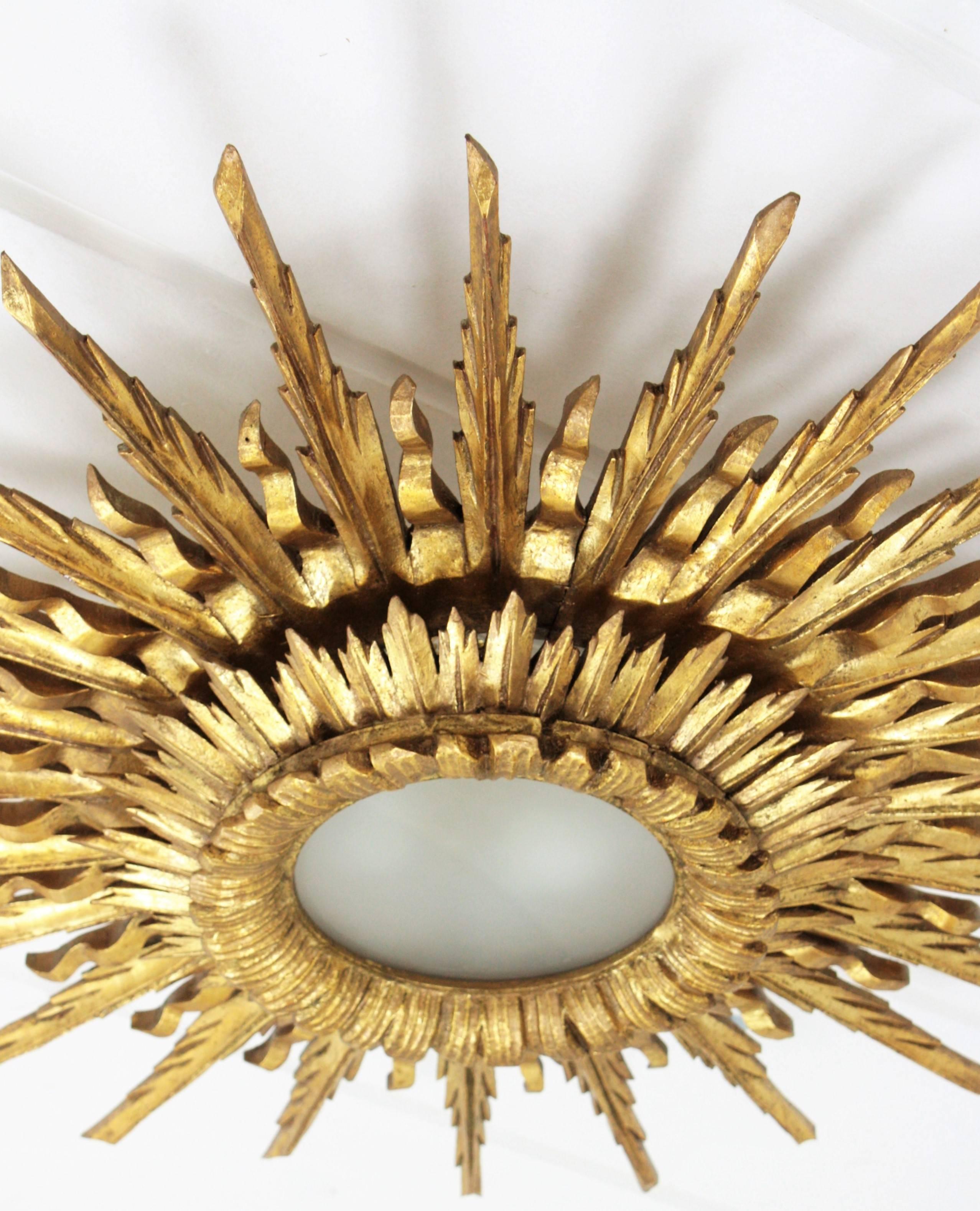 Mid-20th Century Giant 1940s Baroque Gold Leaf Giltwood Sunburst Ceiling Light Fixture or Mirror