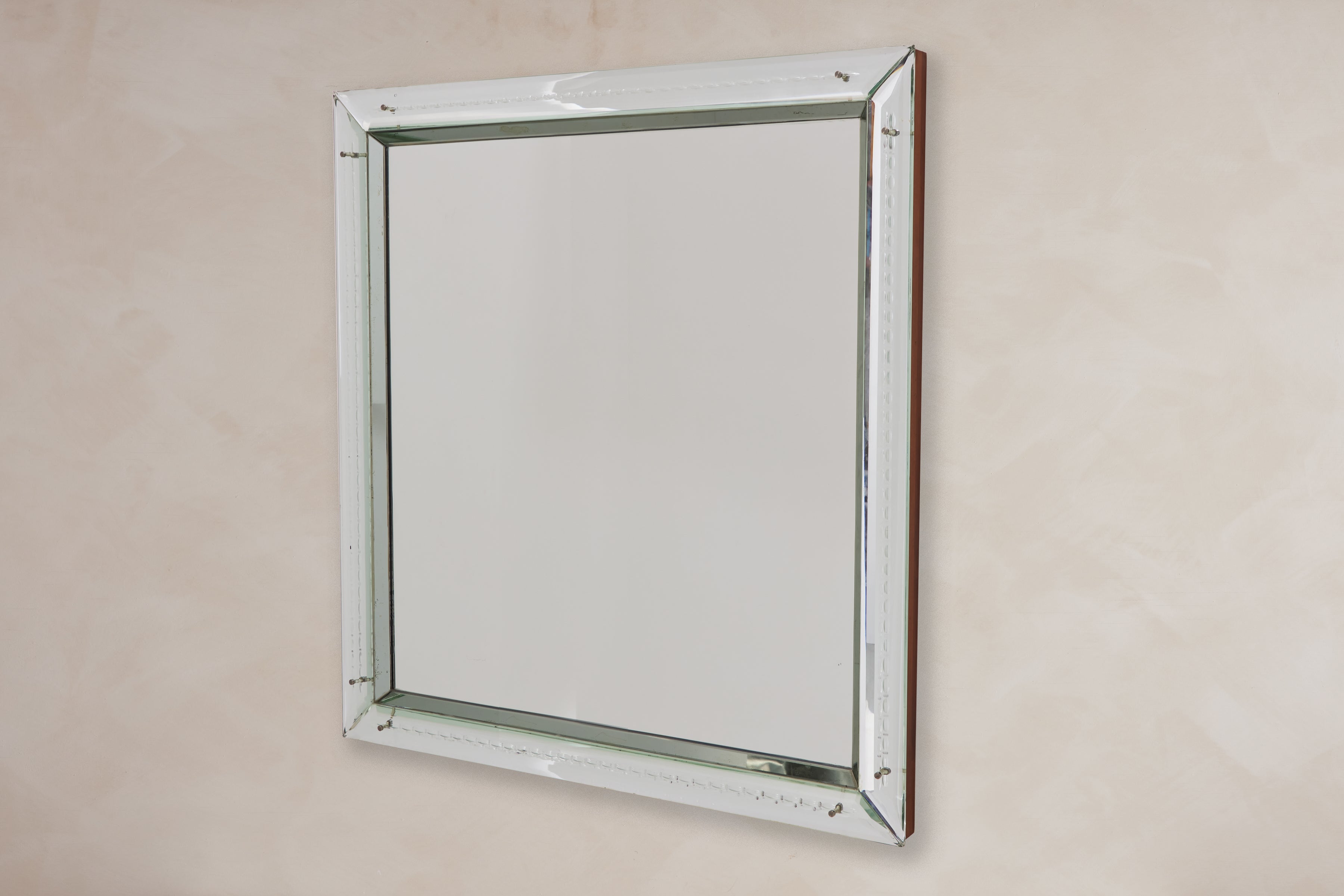 Stunning 1940's Italian mirror with ornate engraved and etched crystal detailing 

Incredible craftsmanship and large in scale. 

Original patina to mirror

Italy, 1940s. 