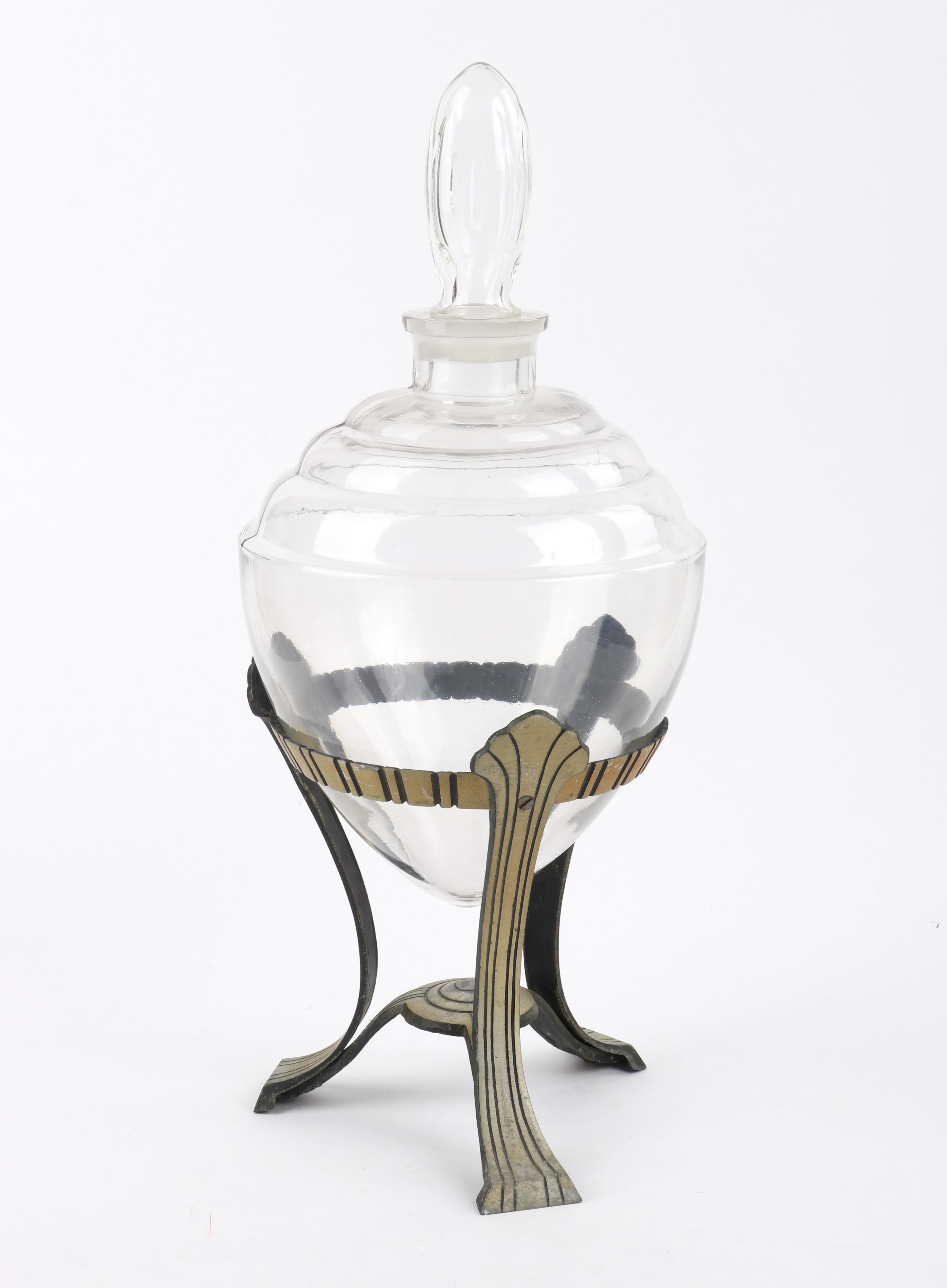 Giant antique heavy art glass urn/factice/apothecary jar, with cap/topper and metal stand. Beautiful Art Deco decorative statement piece that can be used in a variety of ways; to display herbs and botanicals or scent an entire space. Simply fill the