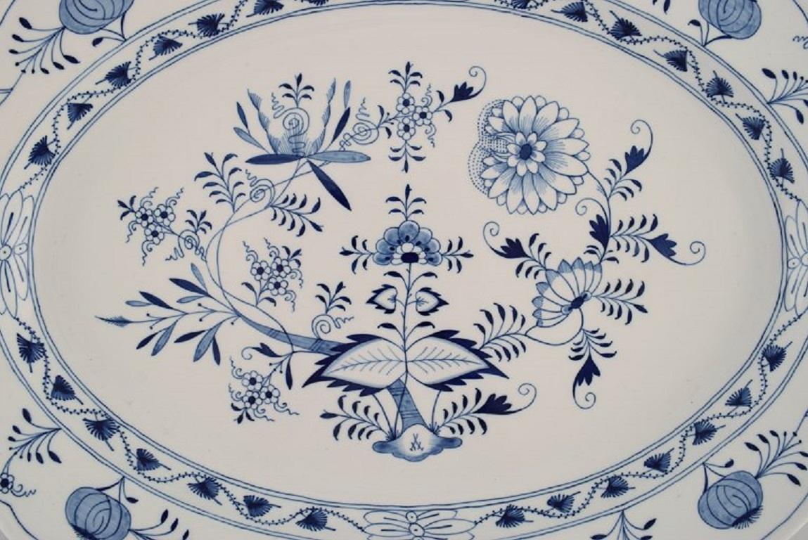 Giant antique Meissen blue onion serving dish in hand-painted porcelain. 
Late 19th century.
Measures: 55 x 42 x 6.5 cm.
In excellent condition.
Stamped.
1st factory quality.