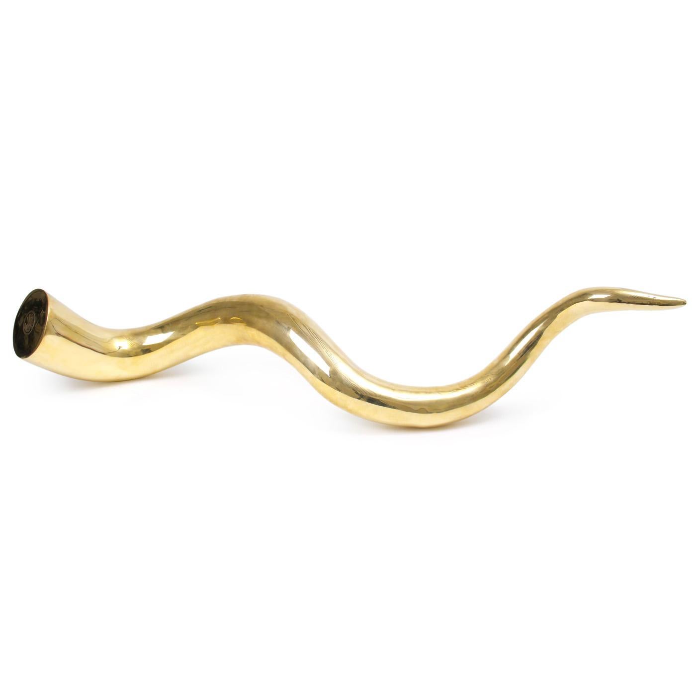 Trophy Piece. Add a heavy dose of handcrafted gravitas and Park Avenue luxury to your home with our Giant Brass Horn. Just the piece to make a statement in an entryway or on a console in a posh living room.

Each piece in our collection of brass