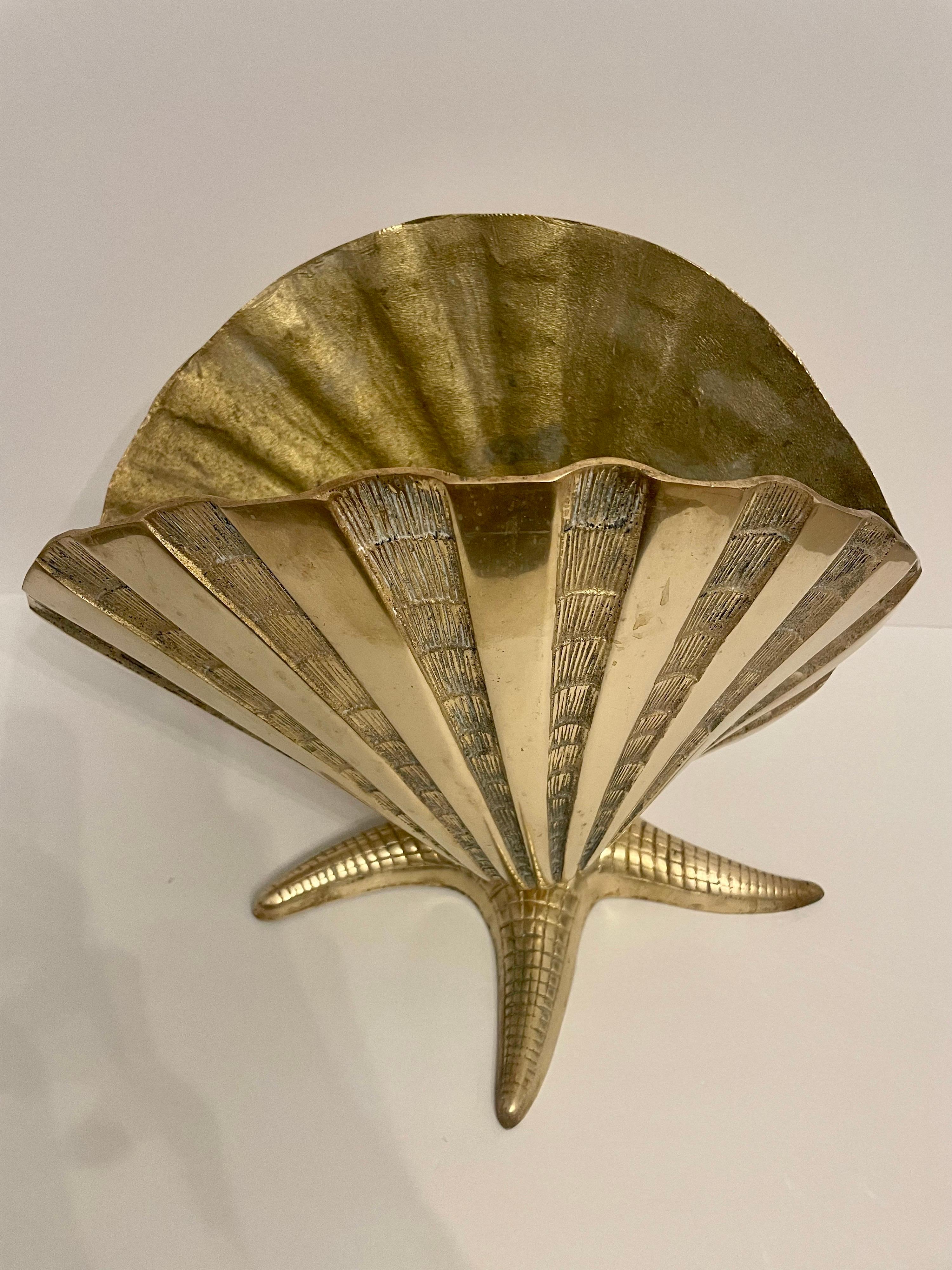 Giant Brass Nautical Clam Shell seashell on starfish base sculpture. Nice vintage condition, hand polished. Heavy with nice details in the casting. Any dark spots in photos is light reflection.