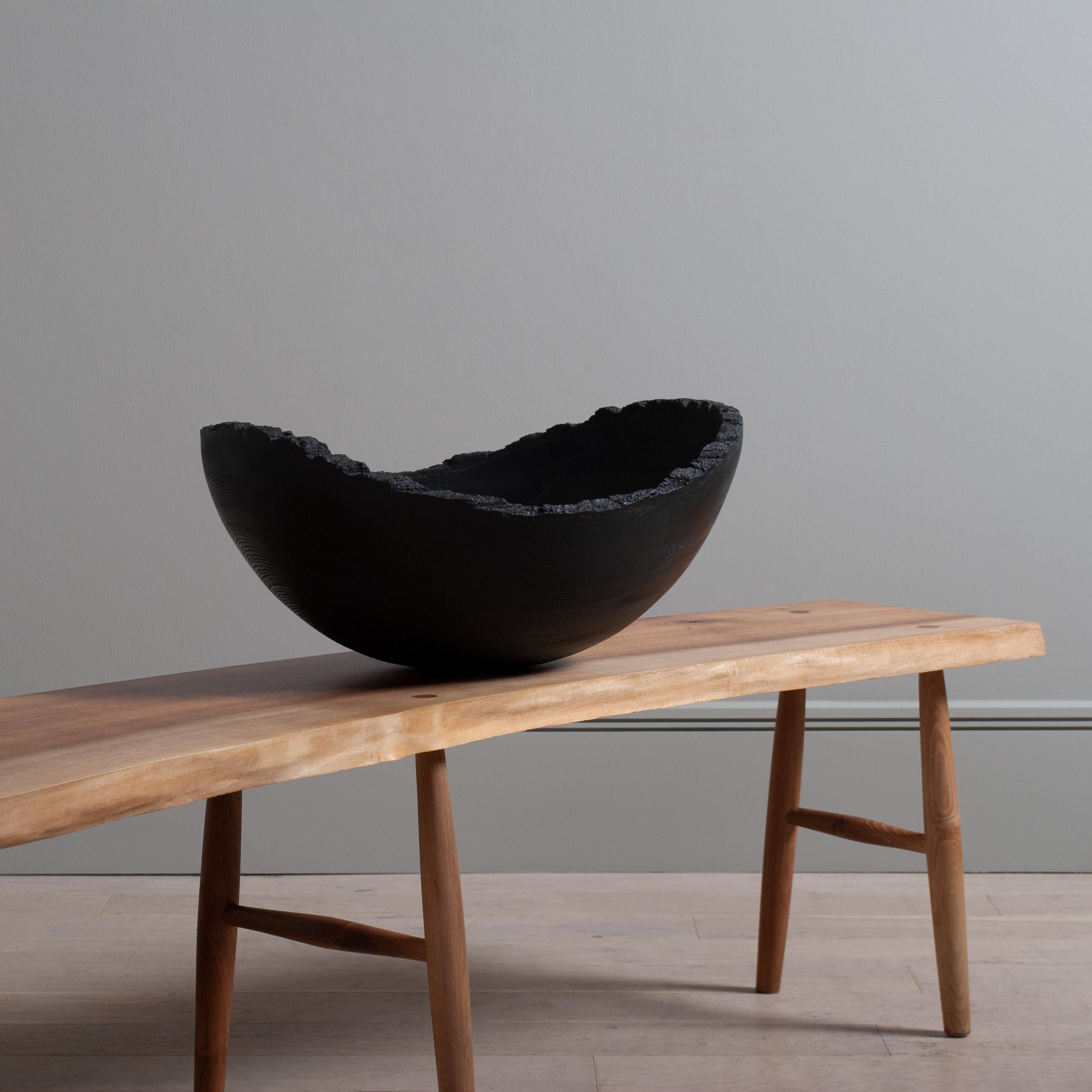 A giant handcrafted Ash centrepiece bowl with full Yakisugi finish. A beautiful piece of handmade contemporary design with a finishing technique that dates back millennia. This bowl is hand turned from English Ash wood. Once shaped the piece
