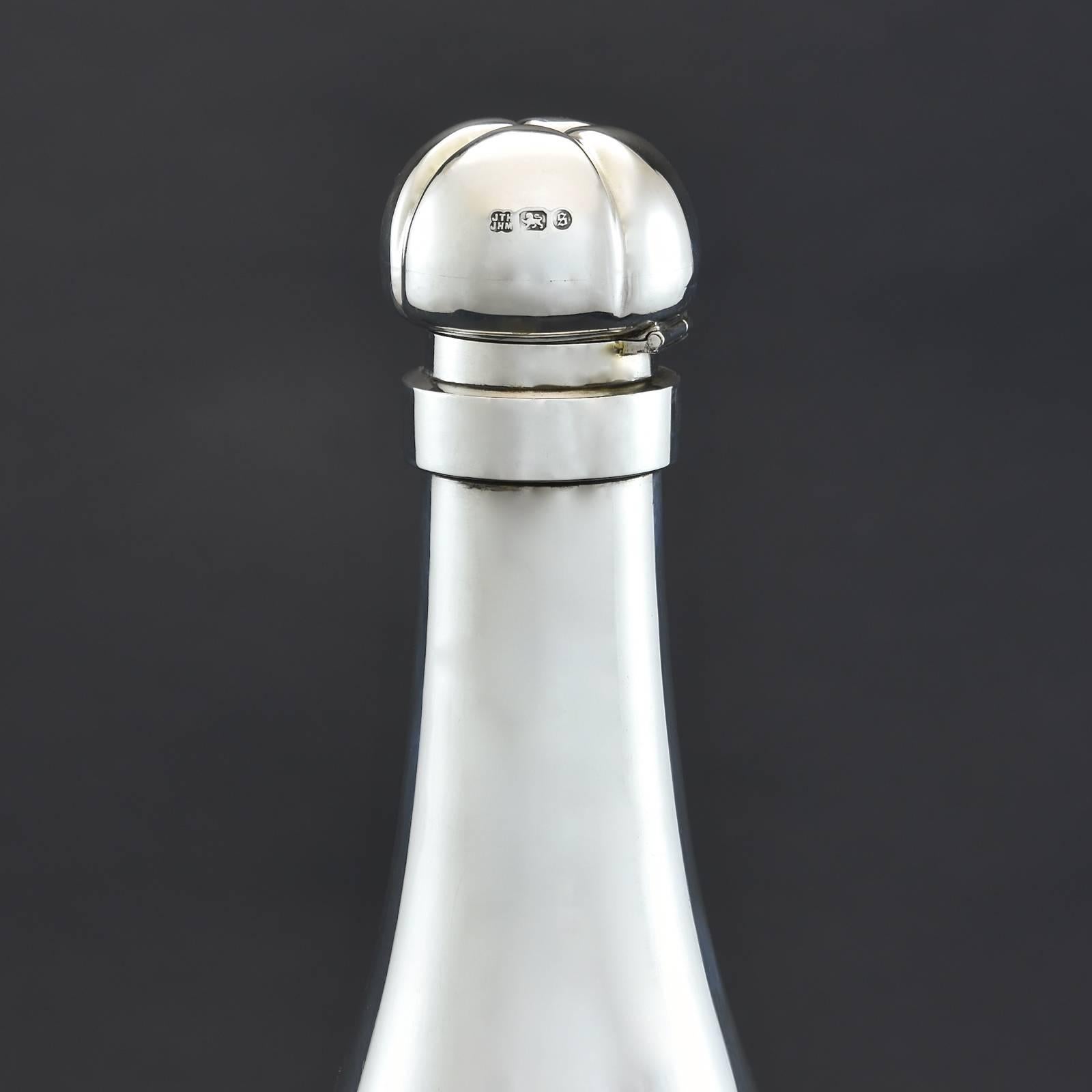 silver champagne bottle