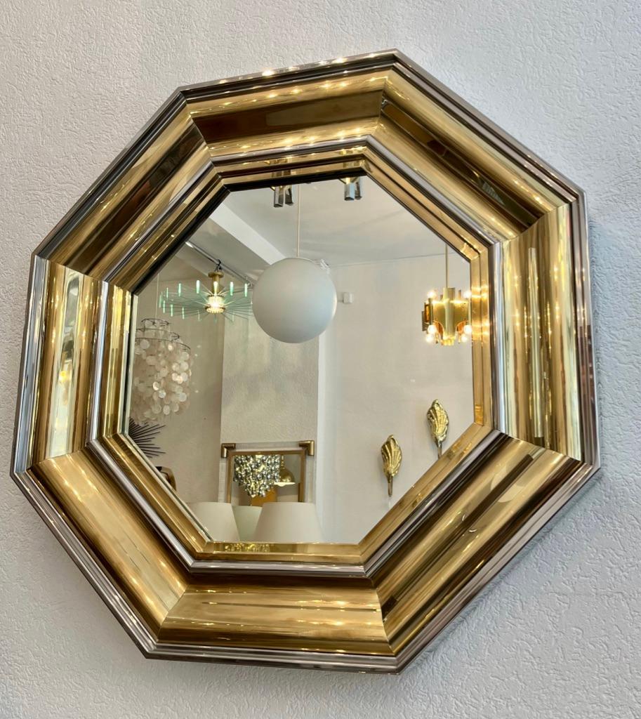 Amazing giant brass and chrome octagonal wall mirror designed by Michel Pigneres and Sandro Petti for Maison Jansen, France ca. 1970s
Very good condition.
Measures: 108 x 108 x 12.5 cm.
 
