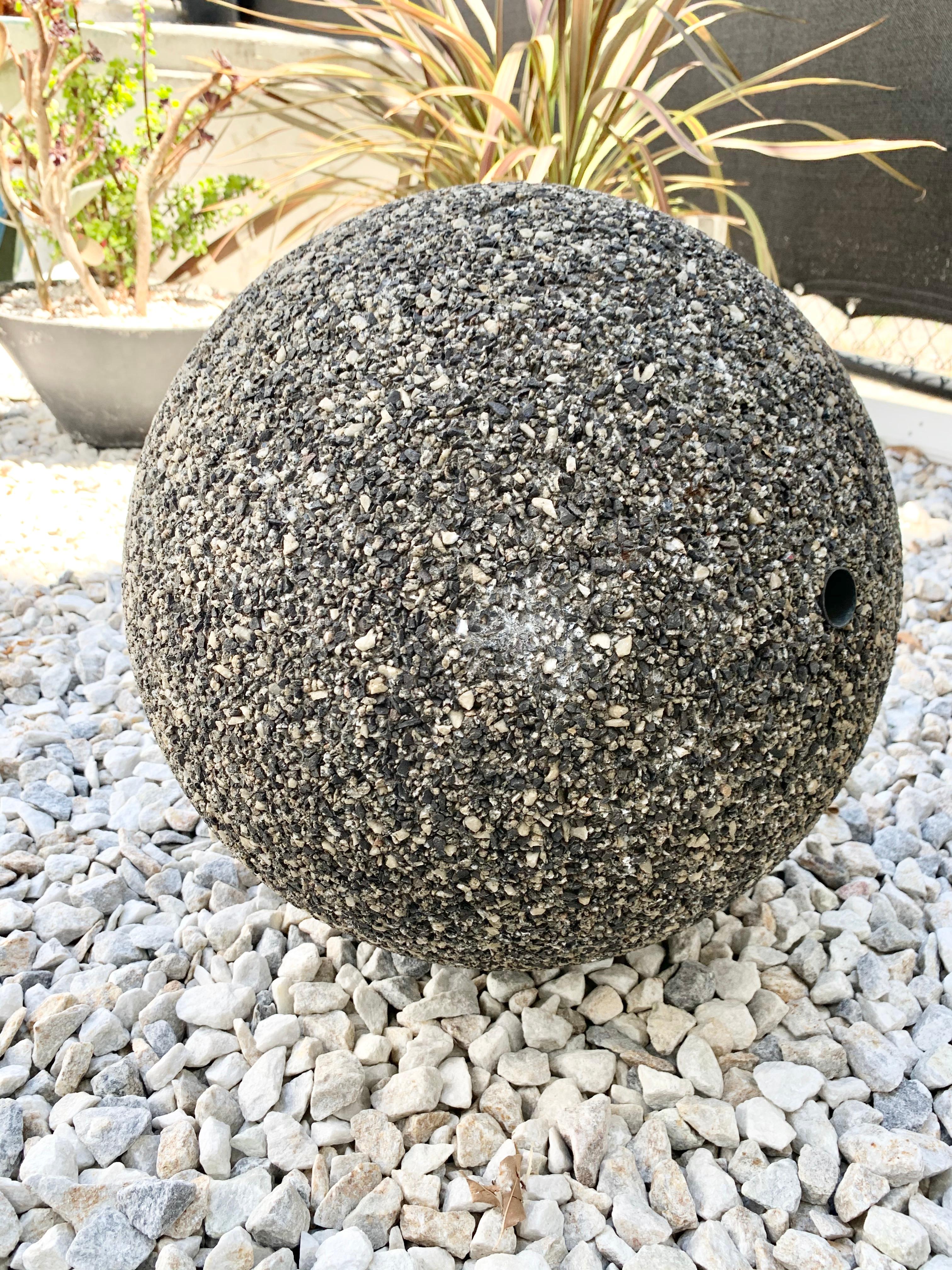 Massive concrete and stone ball used as a fountain in Belgium, 1960s. Pre drilled hole through the middle to allow water through. Extremely heavy, approximately 200 pounds. Perfect water feature or garden decoration.

  