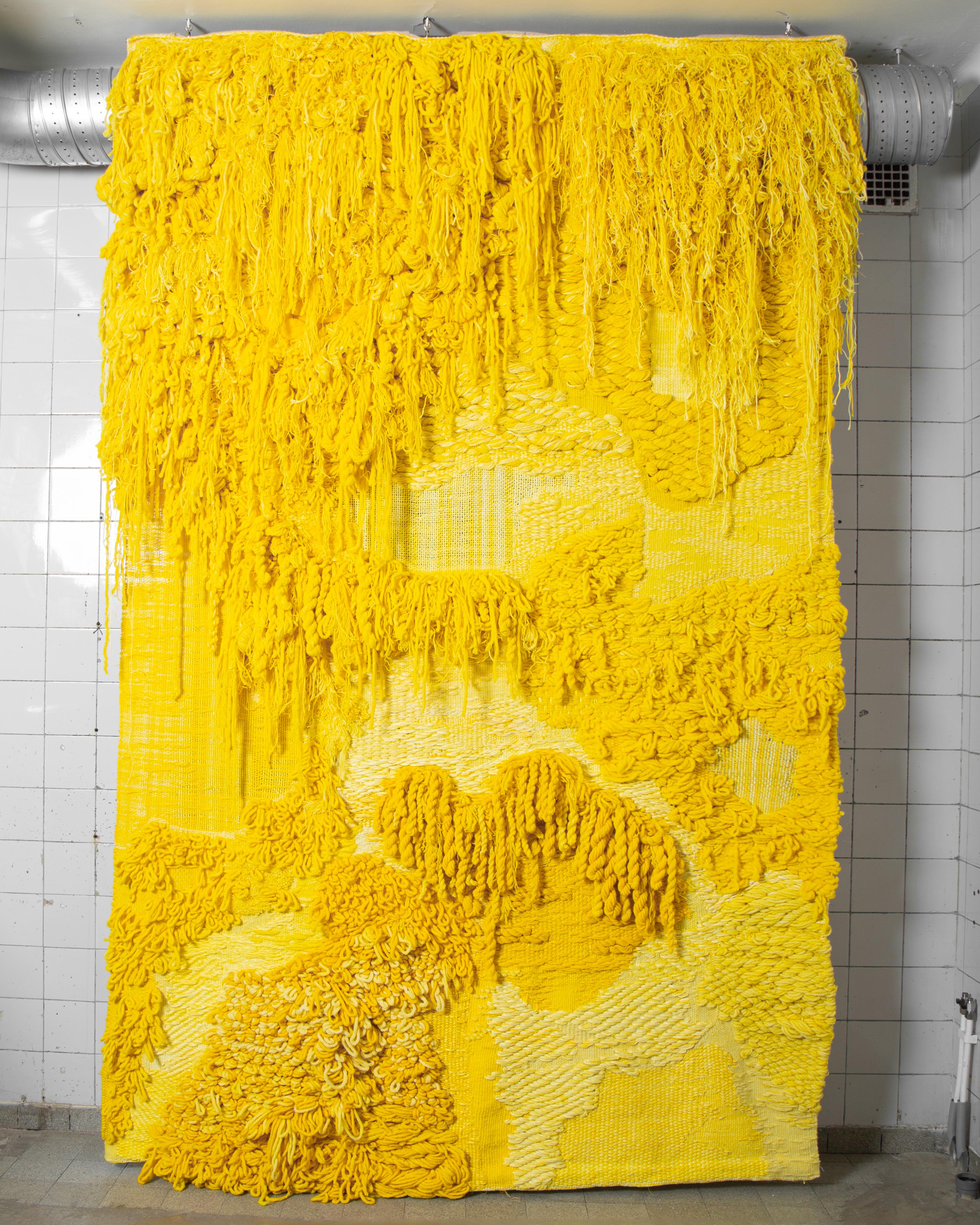 Title: YELLOW III

This handwoven tapestry is complex, tactile and rich in color. The composition is made using various techniques and materials such as dyed linen, wool and artificial hair. 

Born in Skara, Sweden, 1990, Beckman is considered to be