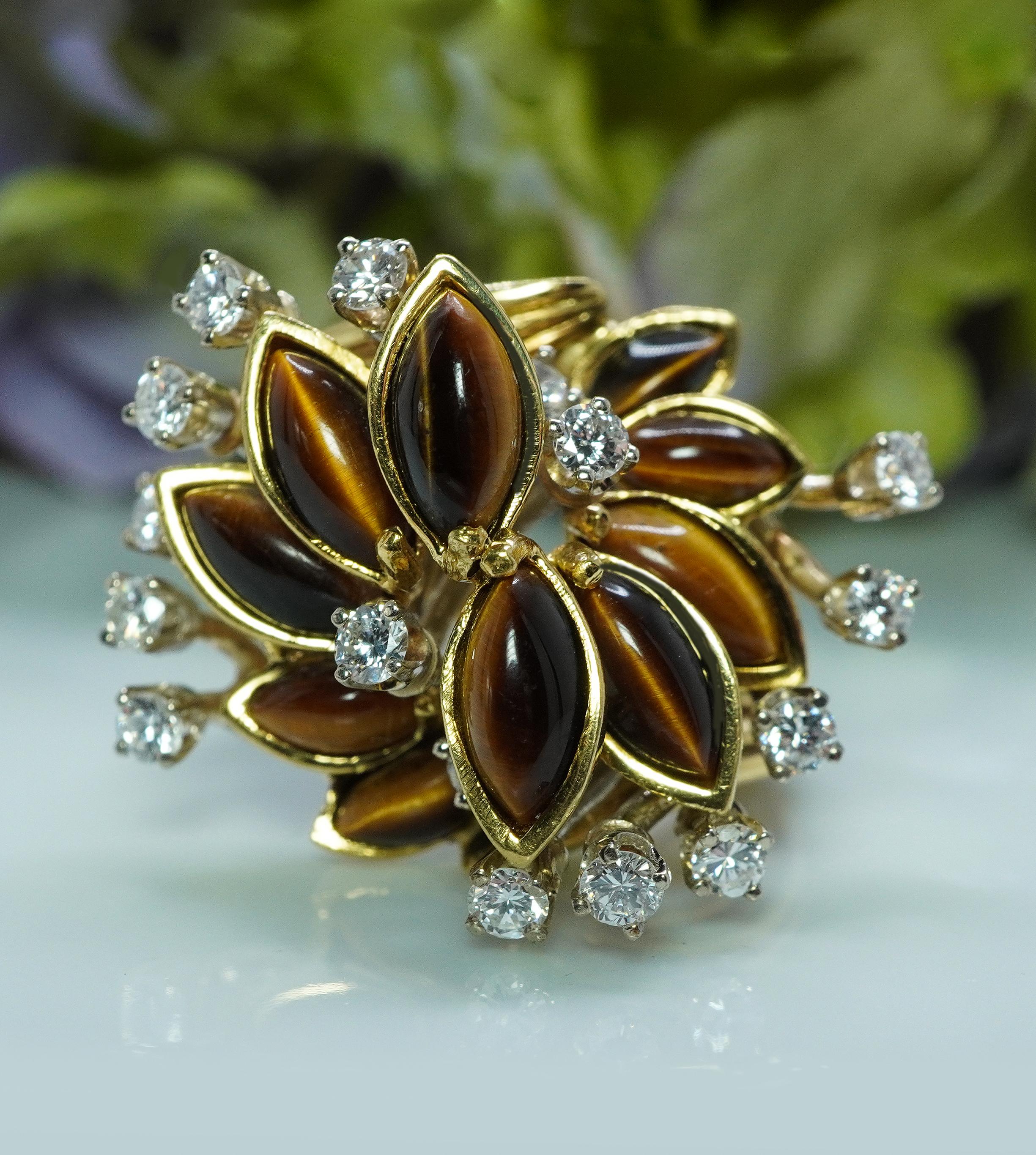  Giant Designer Vintage Tiger Eye Diamond Cocktail Ring 18K Gold Estate Signed CR

This fantastic ring is crafted in luxurious 18K yellow gold, signed CR. The presentation is comprised of beautiful very high quality marquise cut genuine tiger's eye