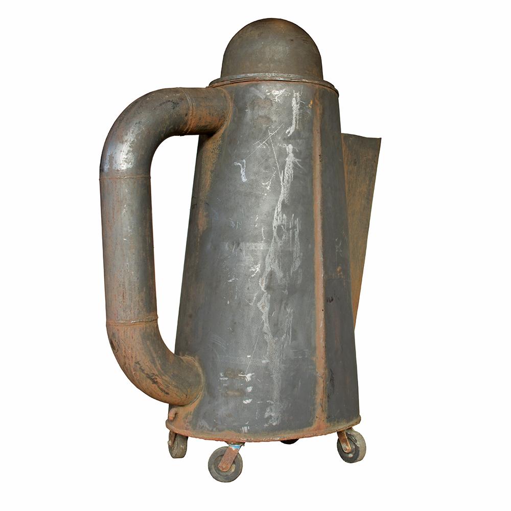This great big coffee pot can serve up one massive cup of joe. This was a roadside attraction from an east coast diner and is completely handmade from iron and sheet metal. It has been mounted on four heavy-duty casters so you can roll it wherever a