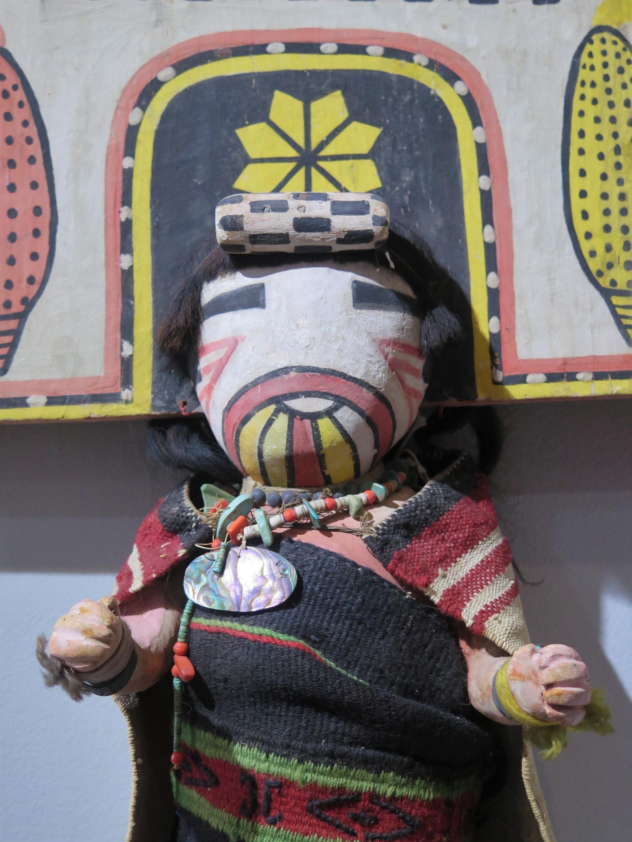 Rare oversized Hopi Palhik Mana Butterfly Kachina of carved and painted wood with cut wood tablita. This must have been a special, perhaps one of a kind piece made for a trading post or gift. The figure is wrapped in wool blanket with necklace of